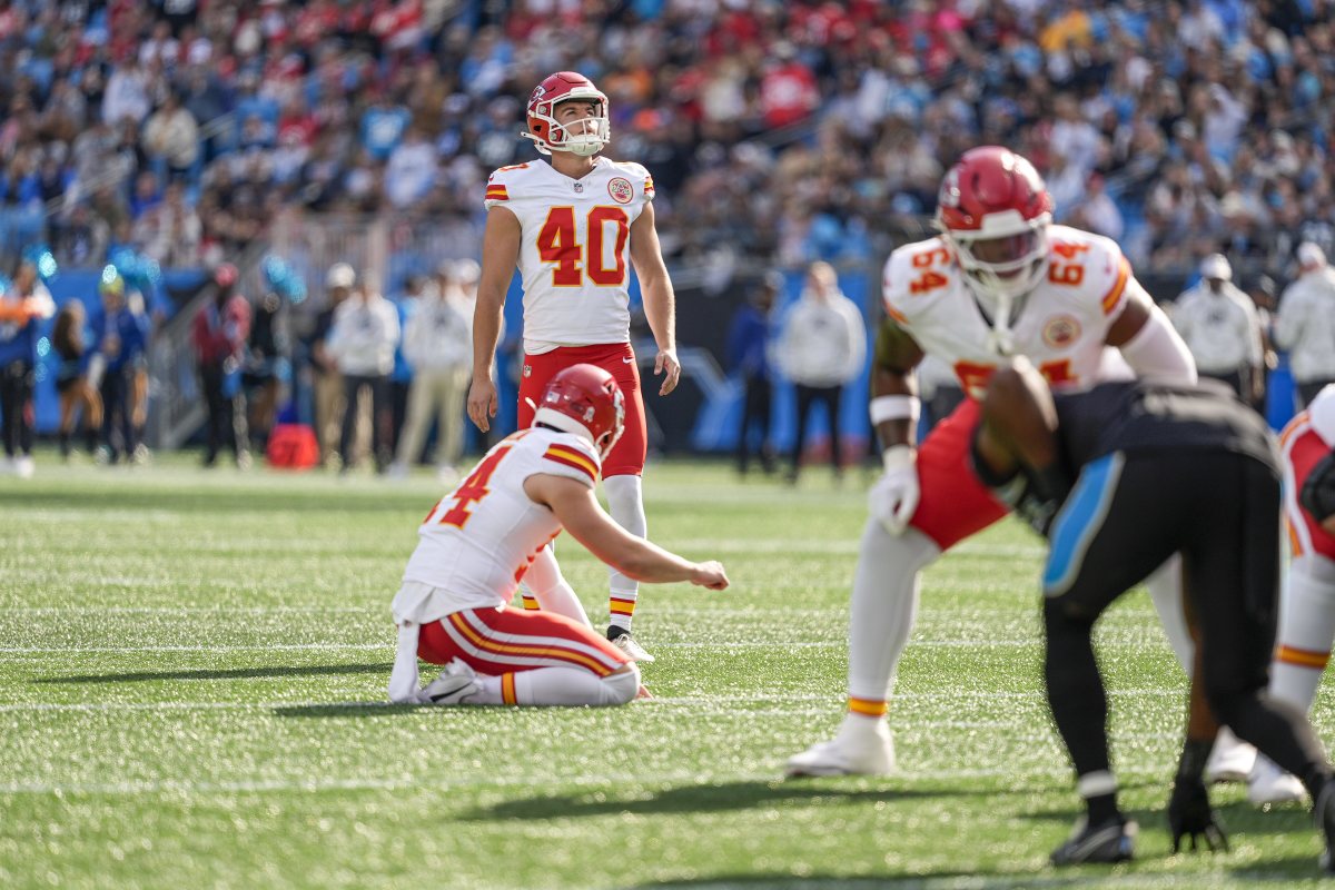 Nov 24, 2024; Charlotte, North Carolina, USA; Kansas City Chiefs place kicker Spencer Shrader (40) looks towards the goal post during a field goal attempt during the first quarter against the Carolina Panthers at Bank of America Stadium.