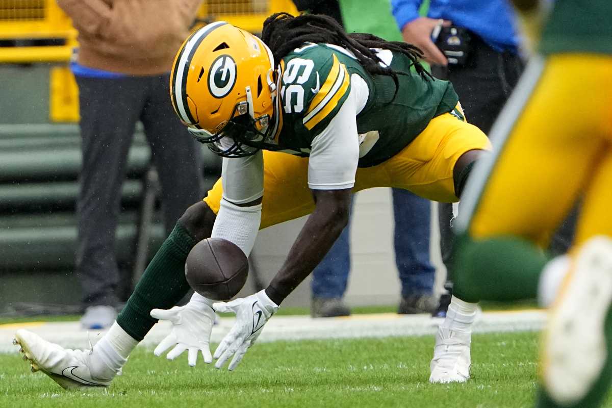 Green Bay Packers linebacker De'Vondre Campbell (59) recovers a fumble by Los Angeles Rams quarterback Brett Rypien during the first quarter of their game at Lambeau Field Sunday, November 5, 2023 in Green Bay, Wisconsin.