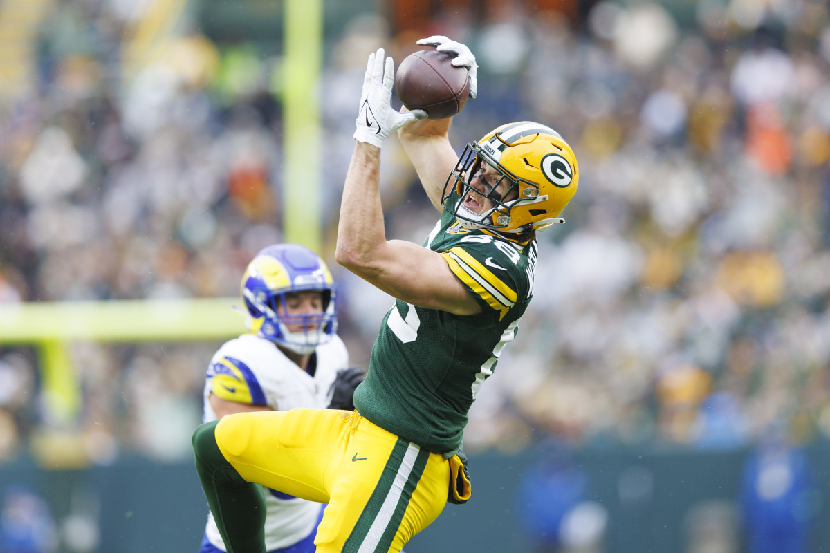 Green Bay Packers tight end Luke Musgrave (88) makes a leaping catch during the third quarter against the Los Angeles Rams at Lambeau Field.