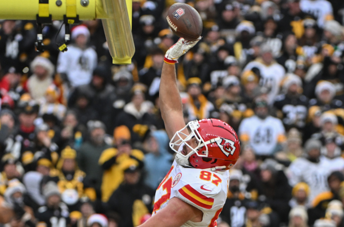 Dec 25, 2024; Pittsburgh, Pennsylvania, USA; Kansas City Chiefs tight end Travis Kelce (87) celebrates a touchdown against the Pittsburgh Steelers during the second half at Acrisure Stadium.