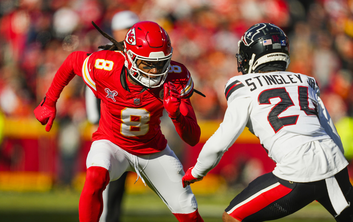 Dec 21, 2024; Kansas City, Missouri, USA; Kansas City Chiefs wide receiver DeAndre Hopkins (8) runs against Houston Texans cornerback Derek Stingley Jr. (24) during the first half at GEHA Field at Arrowhead Stadium.