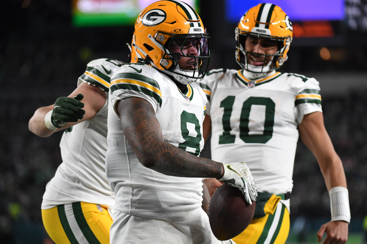 Jan 12, 2025; Philadelphia, Pennsylvania, USA; Green Bay Packers running back Josh Jacobs (8) reacts during the second half in an NFC wild card game at Lincoln Financial Field.