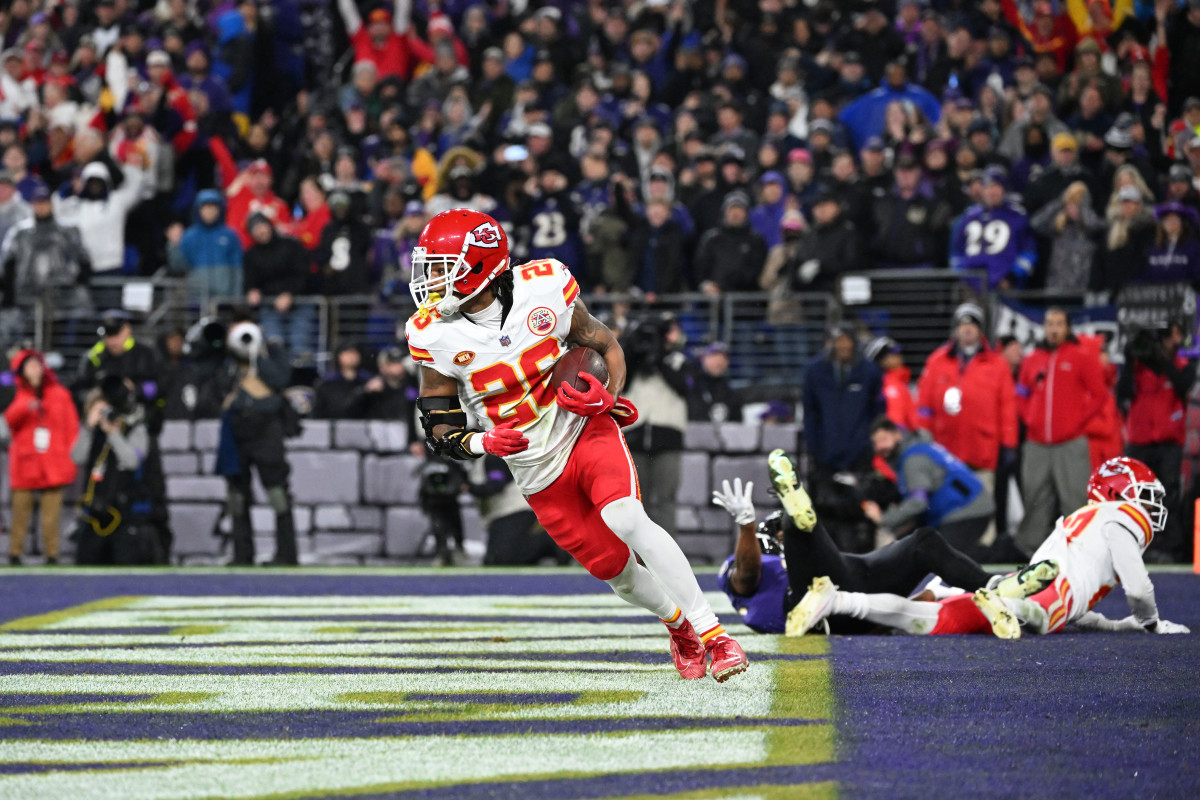 Jan 28, 2024; Baltimore, Maryland, USA; Kansas City Chiefs safety Deon Bush (26) intercepts a pass in the end zone intended for the Baltimore Ravens in the AFC Championship football game at M&T Bank Stadium.