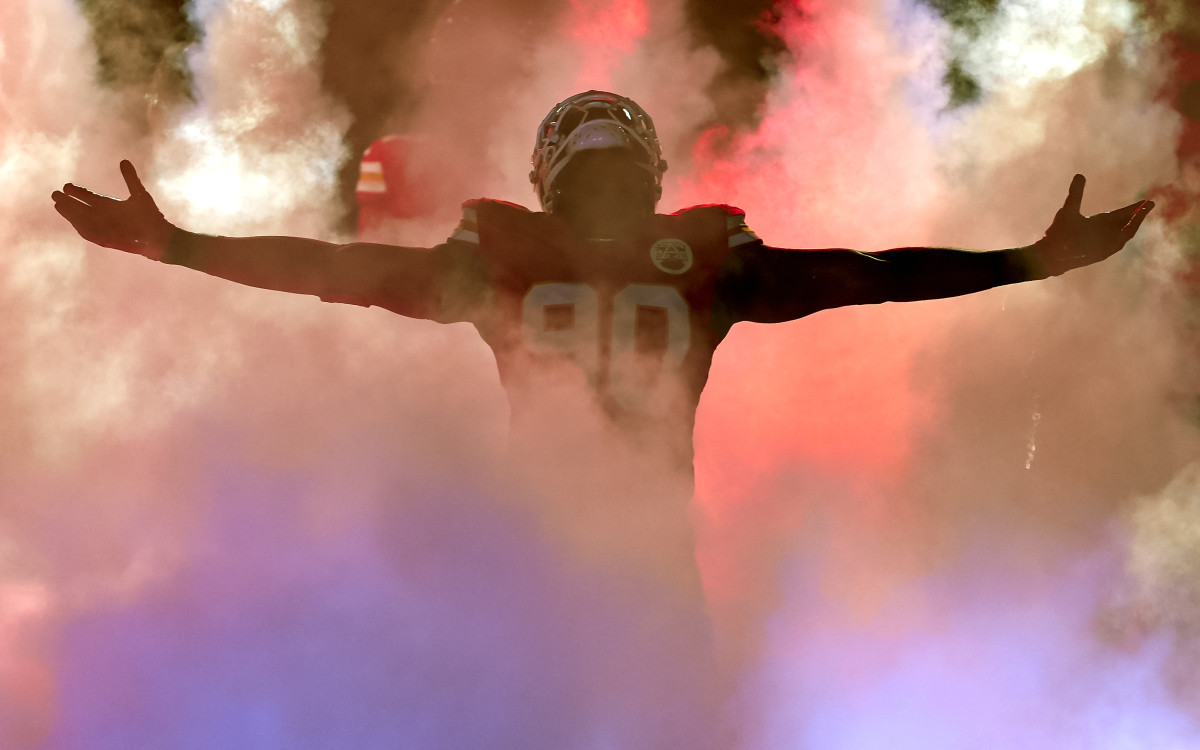 Kansas City Chiefs defensive end Charles Omenihu (90) is introduced prior to a game against the Los Angeles Chargers at GEHA Field at Arrowhead Stadium.