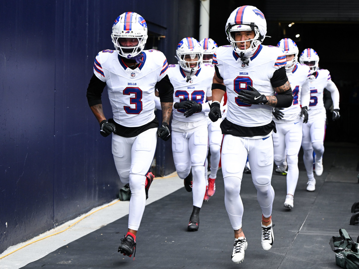 Jan 5, 2025; Foxborough, Massachusetts, USA; Buffalo Bills safety Damar Hamlin (3) and safety Taylor Rapp (9) run onto the field before a game against the New England Patriots at Gillette Stadium.