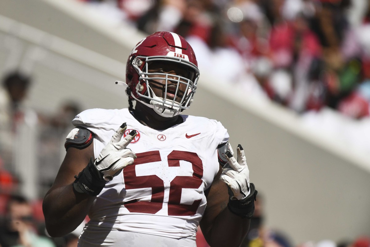 Apr 13, 2024; Tuscaloosa, AL, USA; Alabama offensive lineman Tyler Booker (52) celebrates after the offense scored a touchdown during the A-Day scrimmage at Bryant-Denny Stadium.