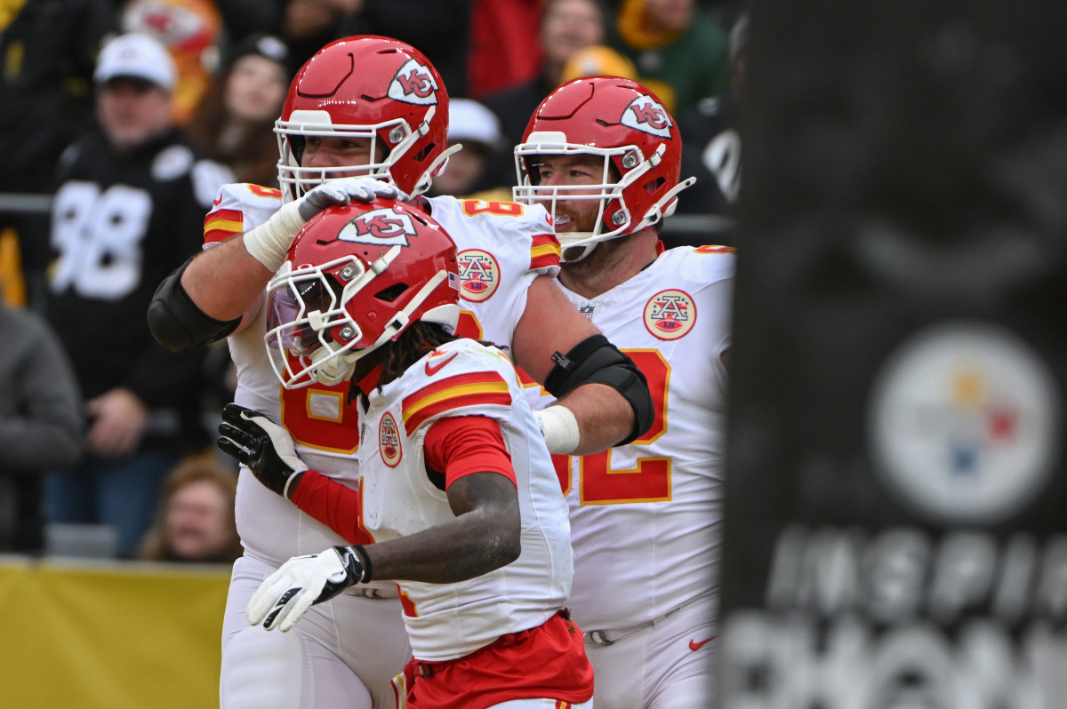 Dec 25, 2024; Pittsburgh, Pennsylvania, USA; Kansas City Chiefs wide receiver Xavier Worthy (1) celebrates with Mike Caliendo (66)after scoring a touchdown against the Pittsburgh Steelers during the first quarter at Acrisure Stadium.