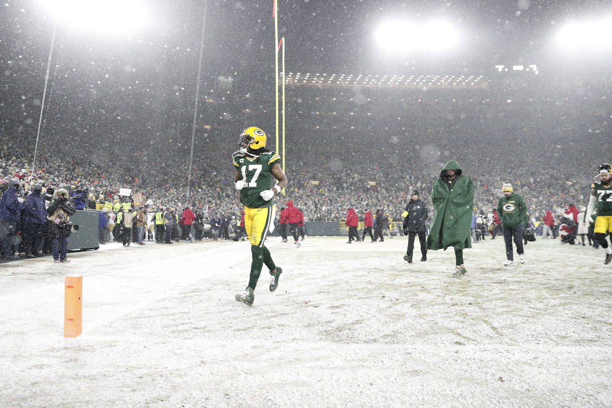 Green Bay Packers wide receiver Davante Adams (17) runs off the field after the NFC Divisional playoff football game against the San Francisco 49ers at Lambeau Field. 