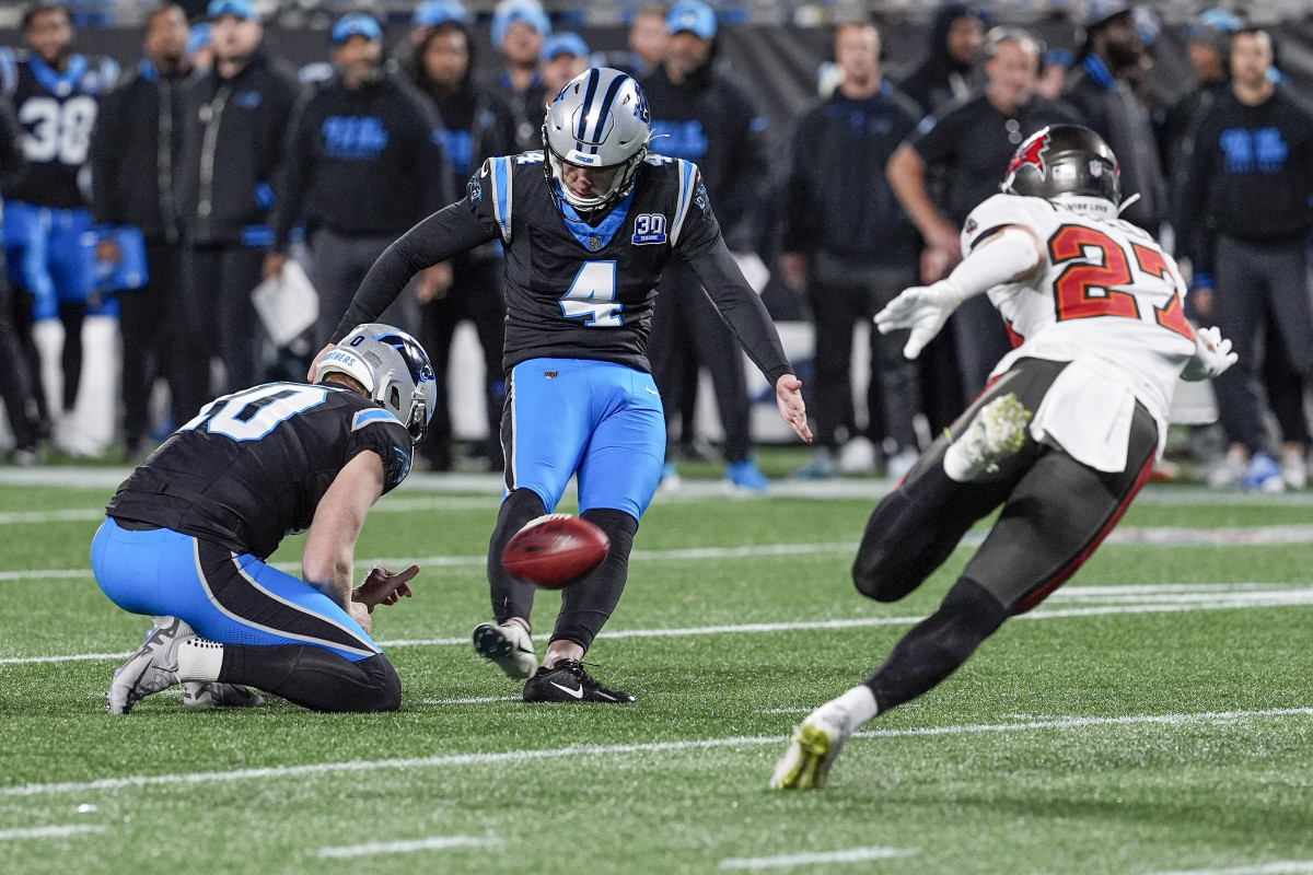 Carolina Panthers place kicker Eddy Pineiro (4) kicks a field goal against the Tampa Bay Buccaneers during the second quarter at Bank of America Stadium. 