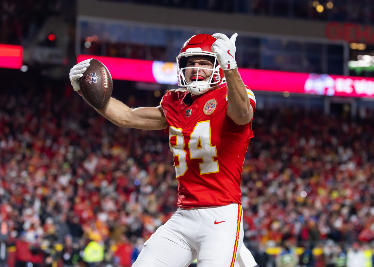 Jan 26, 2025; Kansas City, MO, USA; Kansas City Chiefs wide receiver Justin Watson (84) celebrates a catch for a two point conversion against the Buffalo Bills during the second half in the AFC Championship game at GEHA Field at Arrowhead Stadium.