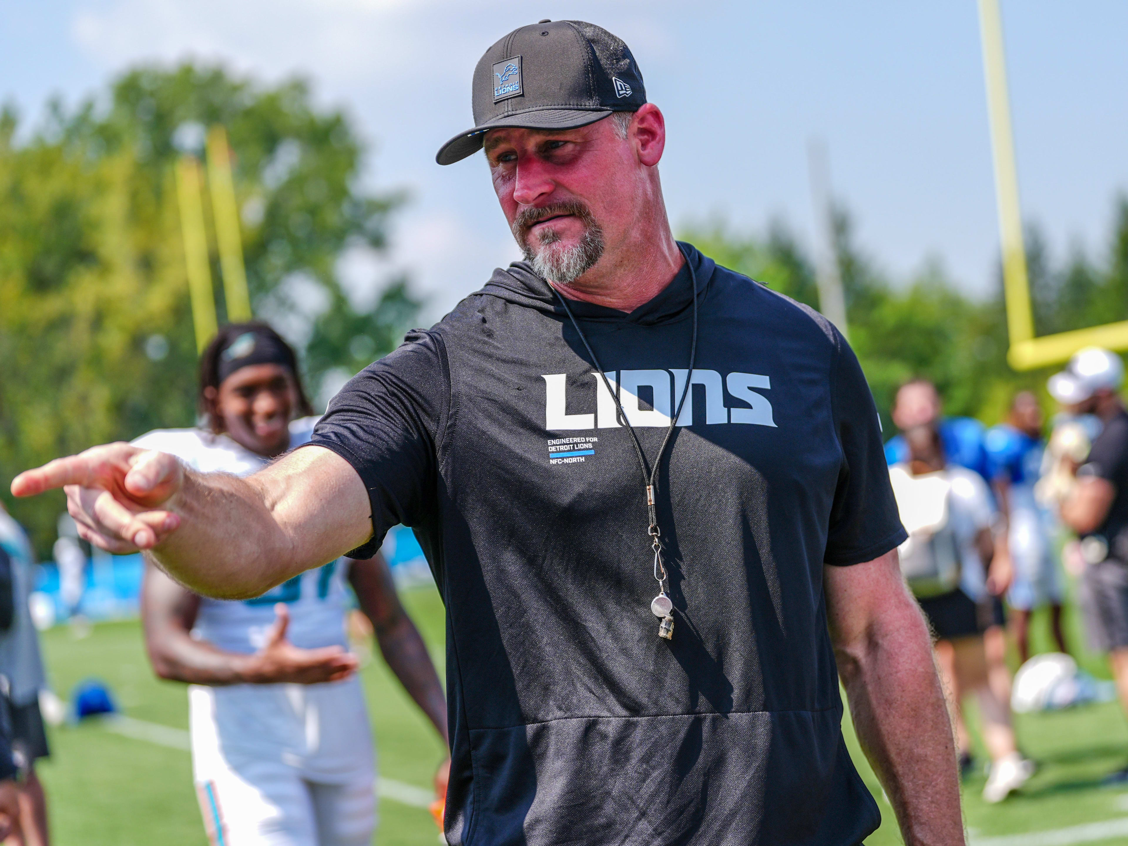 Detroit Lions head coach Dan Campbell talks to staff at the end of the joint practice with the Miami Dolphins at the Lions headquarters and training facility in Allen Park, Thursday, Aug. 14 2025
