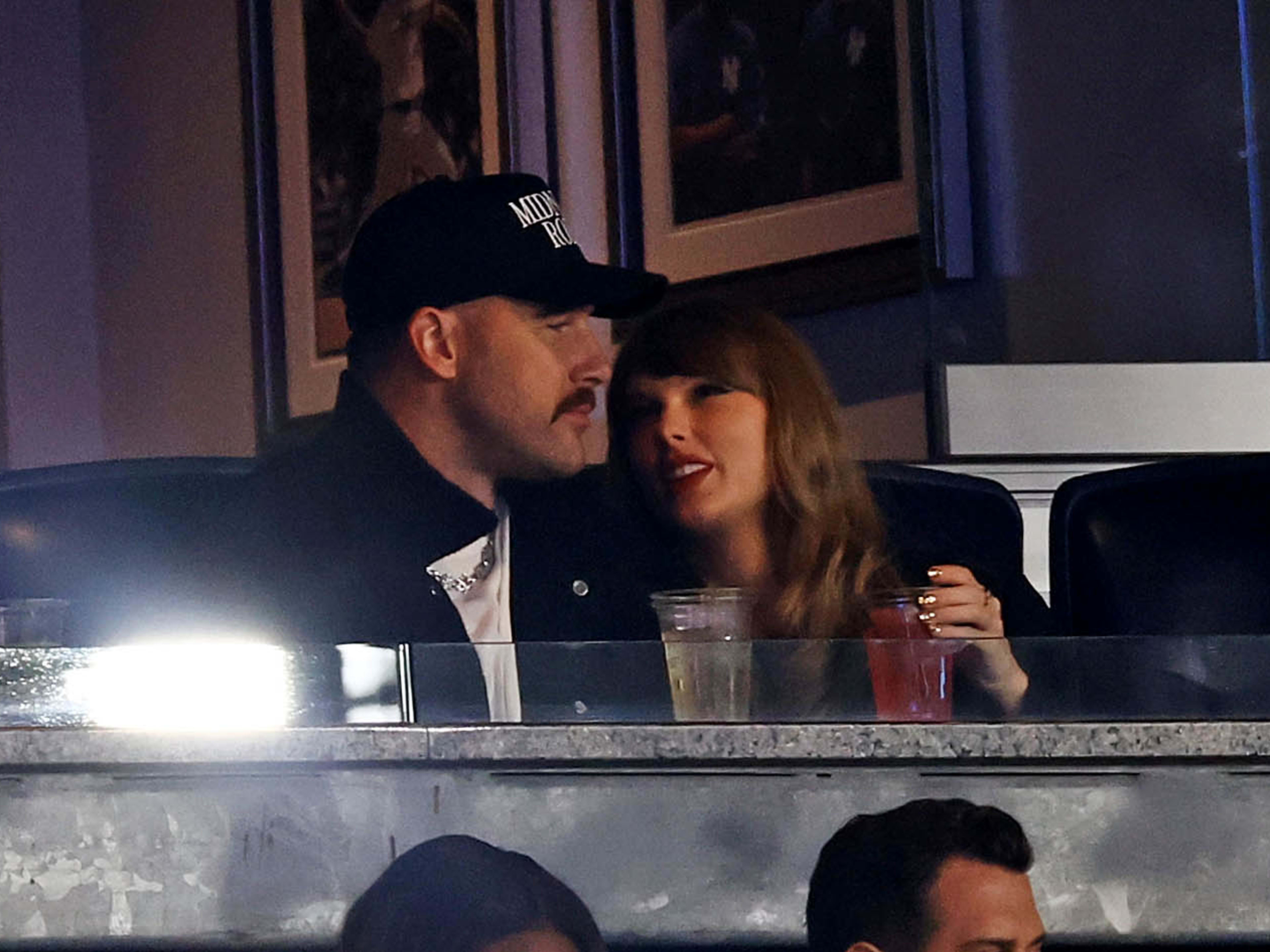 Oct 14, 2024; Bronx, New York, USA; Recording artist Taylor Swift and Kansas City Chiefs tight end Travis Kelce watch game one of the ALCS for the 2024 MLB Playoffs between the New York Yankees and the Cleveland Guardians at Yankee Stadium. Mandatory Credit: Vincent Carchietta-Imagn Images
