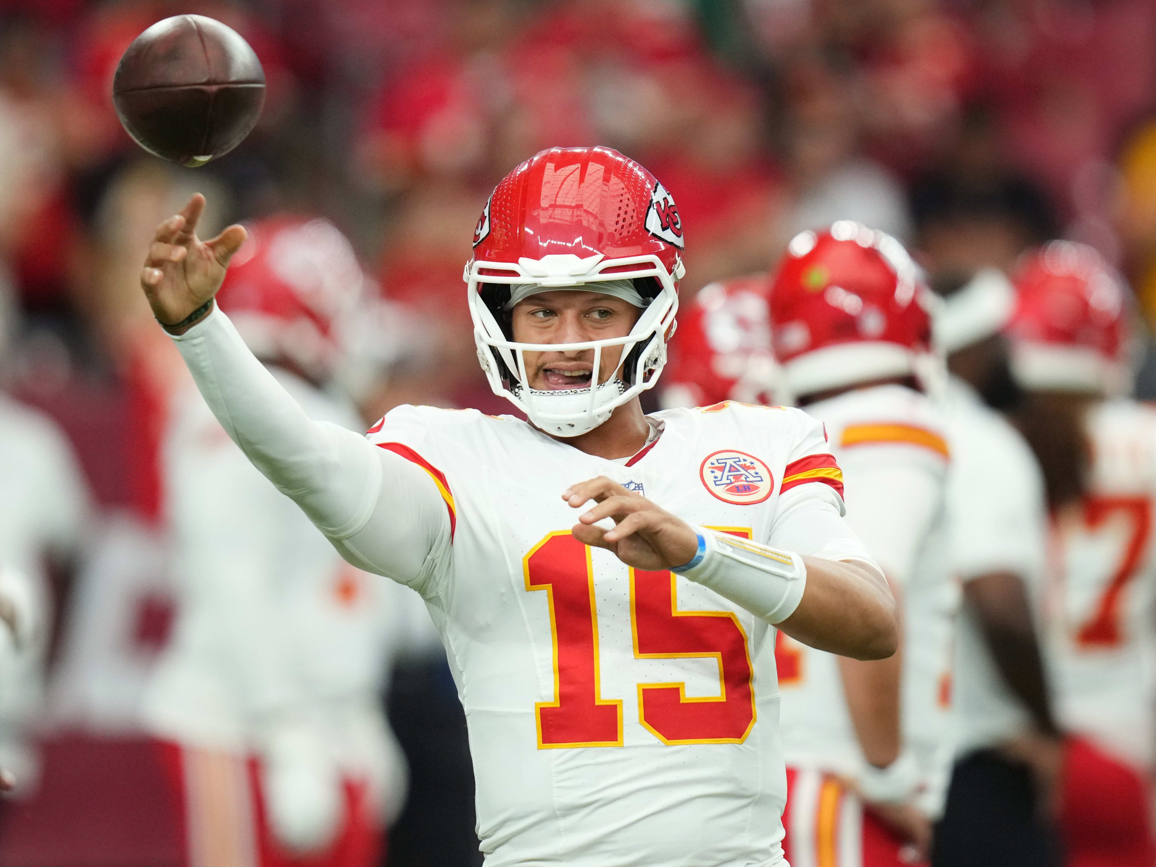 Kansas City Chiefs quarterback Patrick Mahomes (15) warms up before their preseason game against the Arizona Cardinals at State Farm Stadium