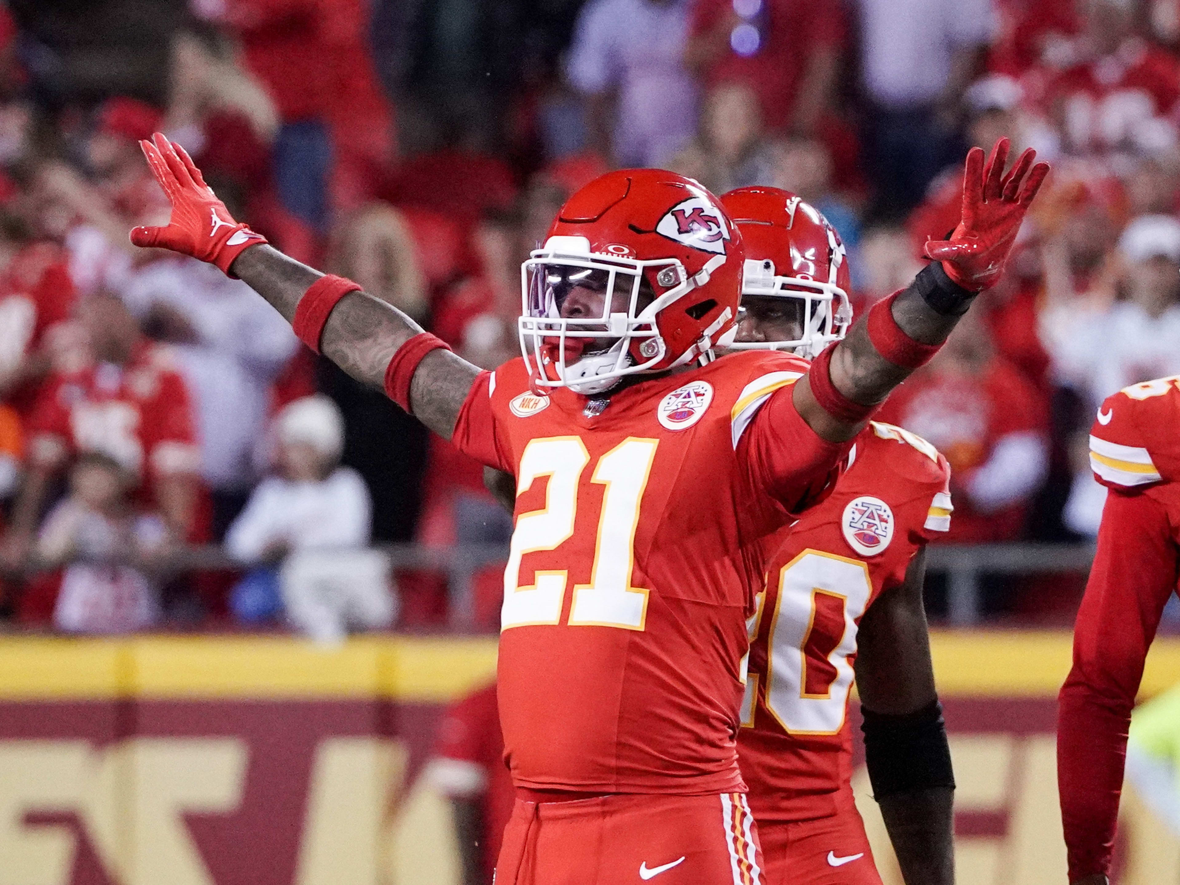 Kansas City Chiefs safety Mike Edwards (21) celebrates after a play against the Denver Broncos during the game at GEHA Field at Arrowhead Stadium.