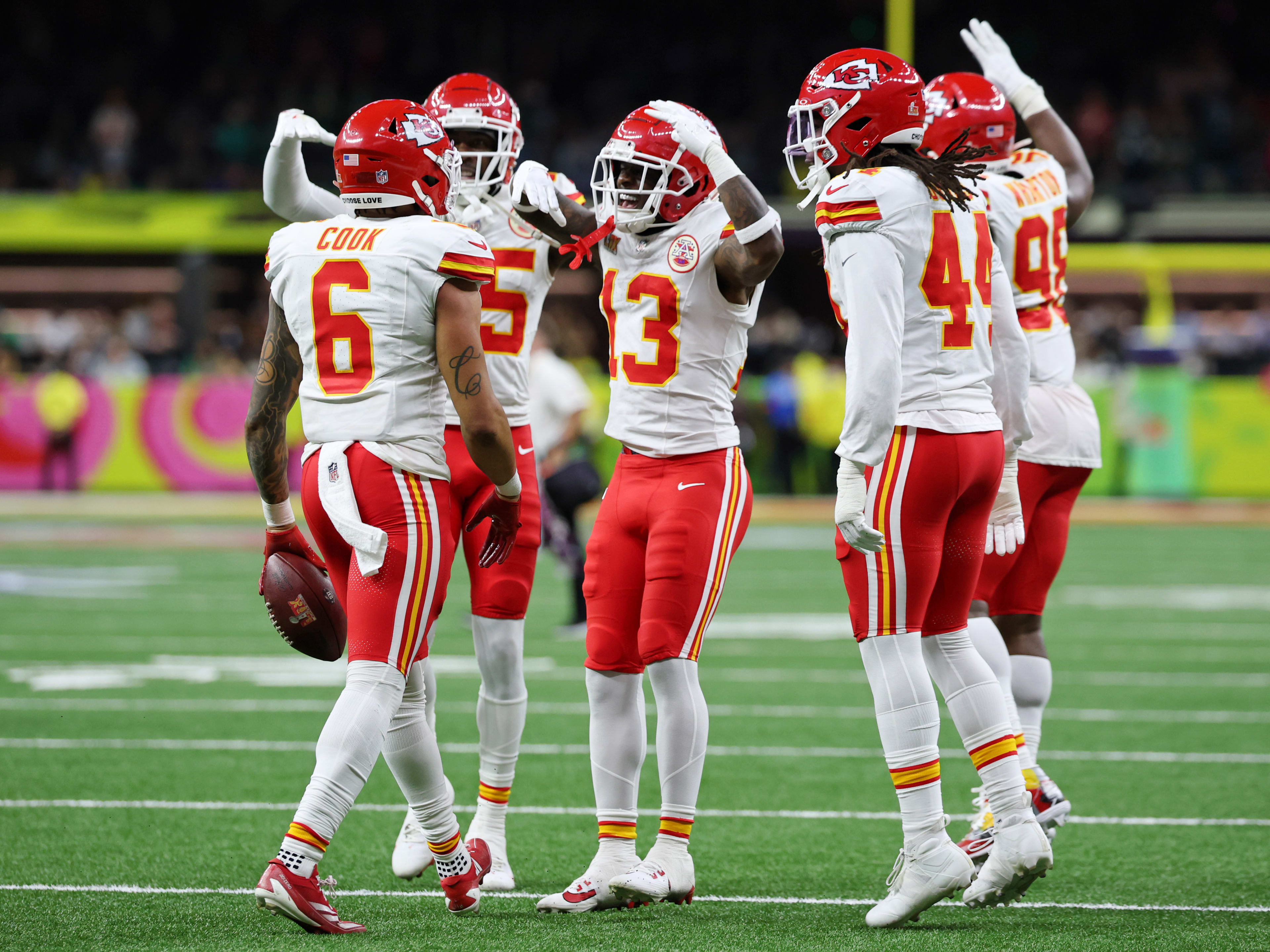 Kansas City Chiefs safety Bryan Cook (6) is congratulated by teammates after making an interception against the Philadelphia Eagles during the first half of Super Bowl LIX