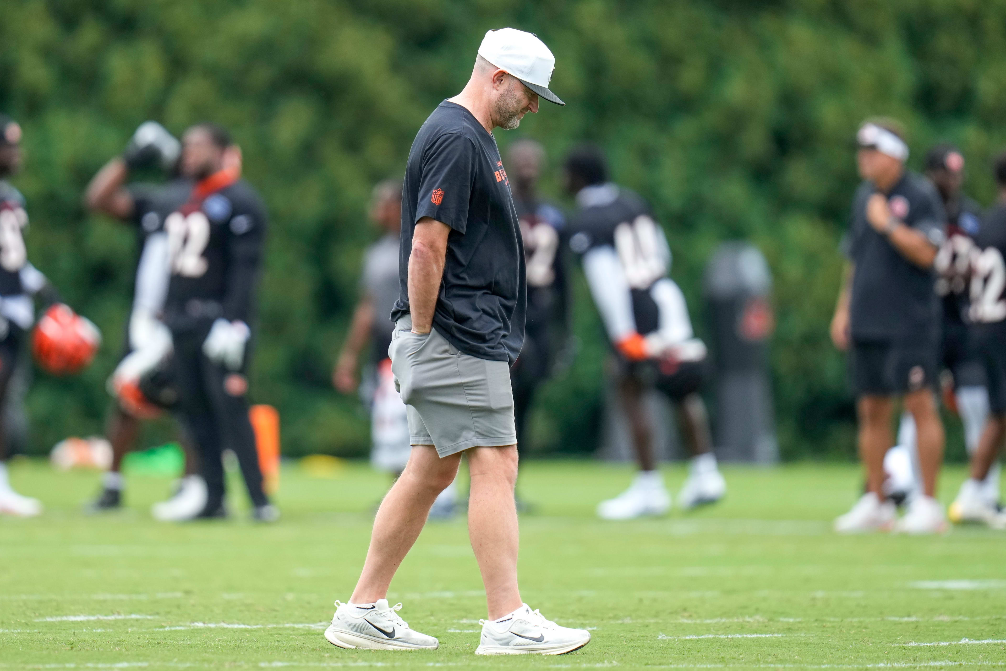 Director of player personnel Duke Tobin walks the field during practice at the Paycor Stadium practice field in downtown Cincinnati on Wednesday, Aug. 20, 2025.
