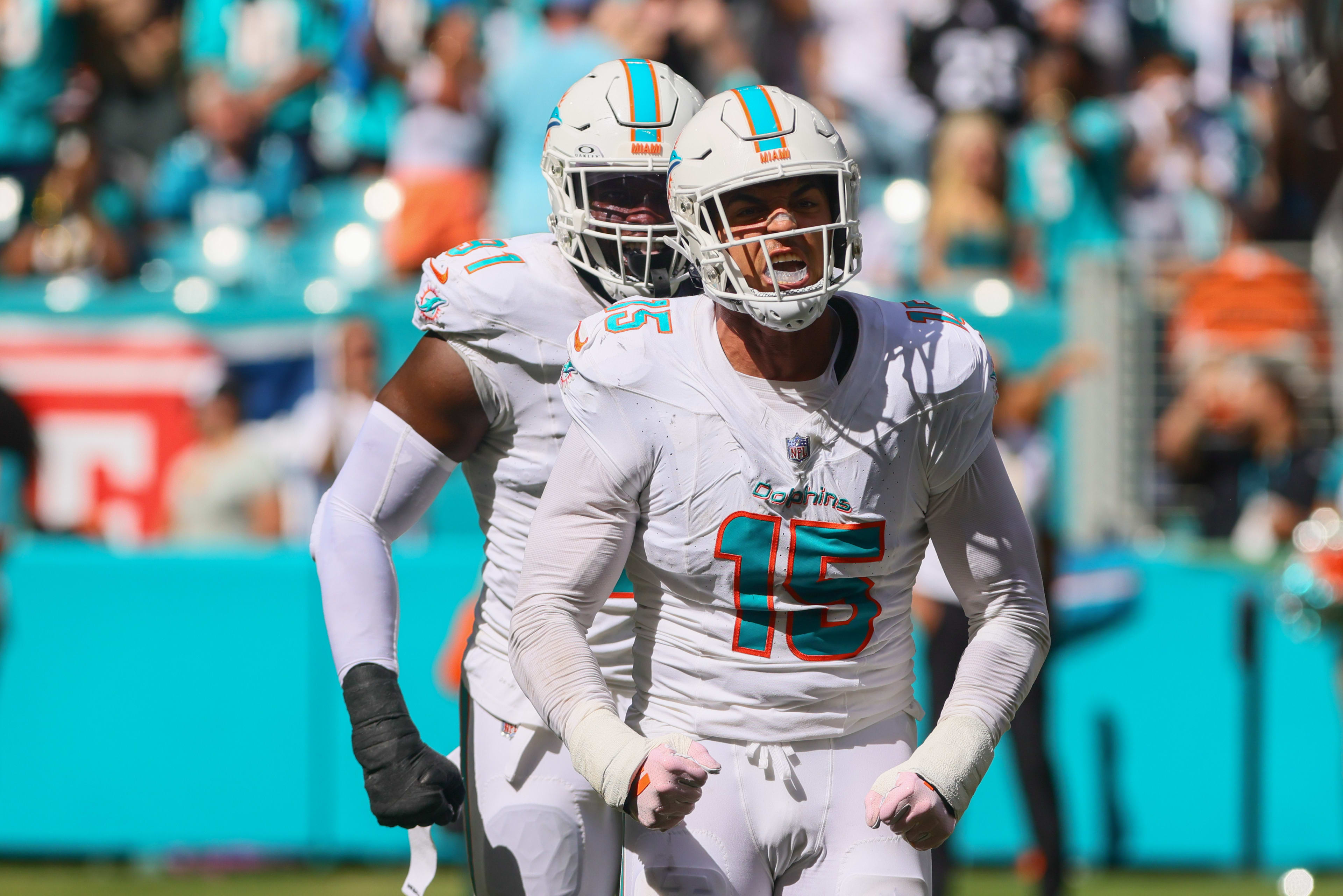 Sep 8, 2024; Miami Gardens, Florida, USA; Miami Dolphins linebacker Jaelan Phillips (15) celebrates after sacking Jacksonville Jaguars quarterback Trevor Lawrence (not pictured) during the fourth quarter at Hard Rock Stadium. Mandatory Credit: Sam Navarro-Imagn Images
