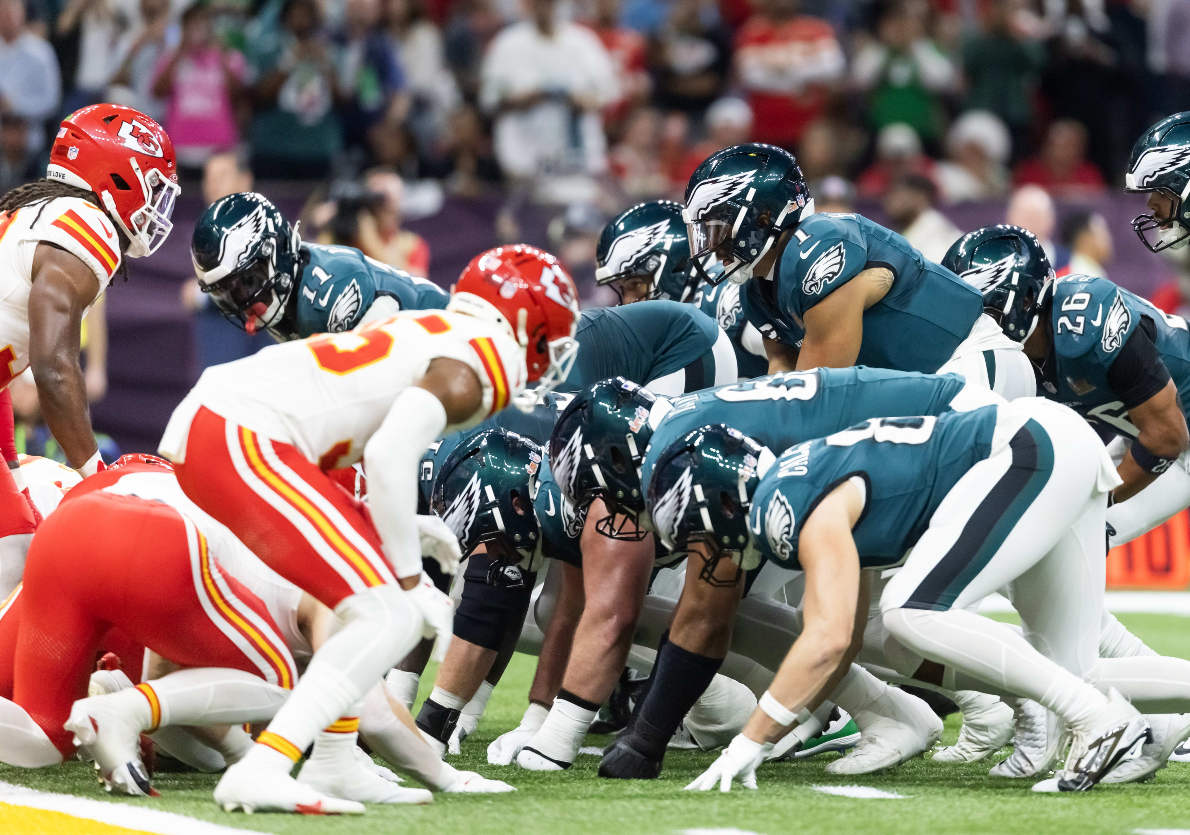 Feb 9, 2025; New Orleans, LA, USA; Philadelphia Eagles  quarterback Jalen Hurts (1) lines up for the tush push play on the goal line against the Kansas City Chiefs during Super Bowl LIX at Ceasars Superdome. 
