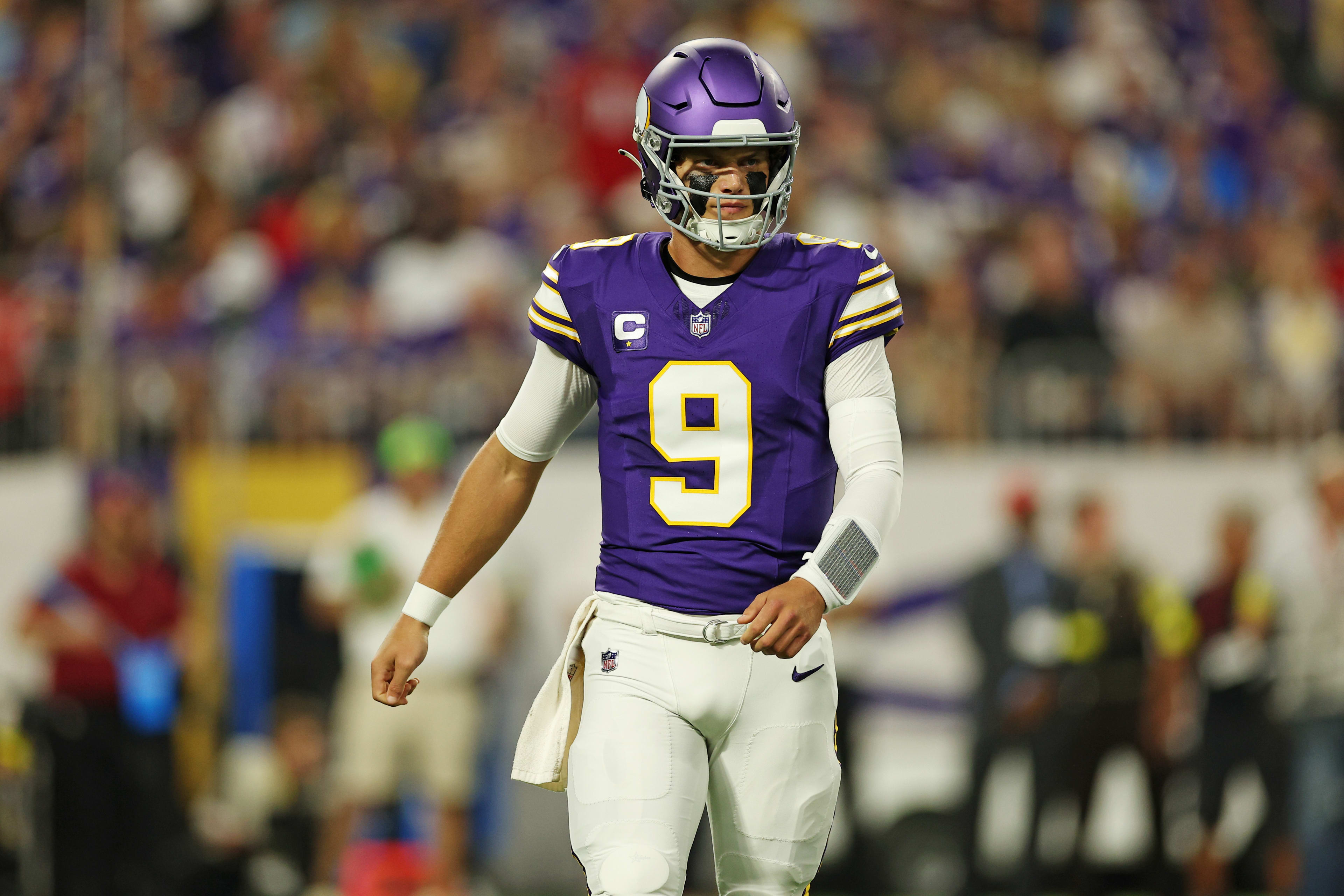 Sep 14, 2025; Minneapolis, Minnesota, USA; Minnesota Vikings quarterback J.J. McCarthy (9) reacts after a play during the first half against the Atlanta Falcons at U.S. Bank Stadium. 