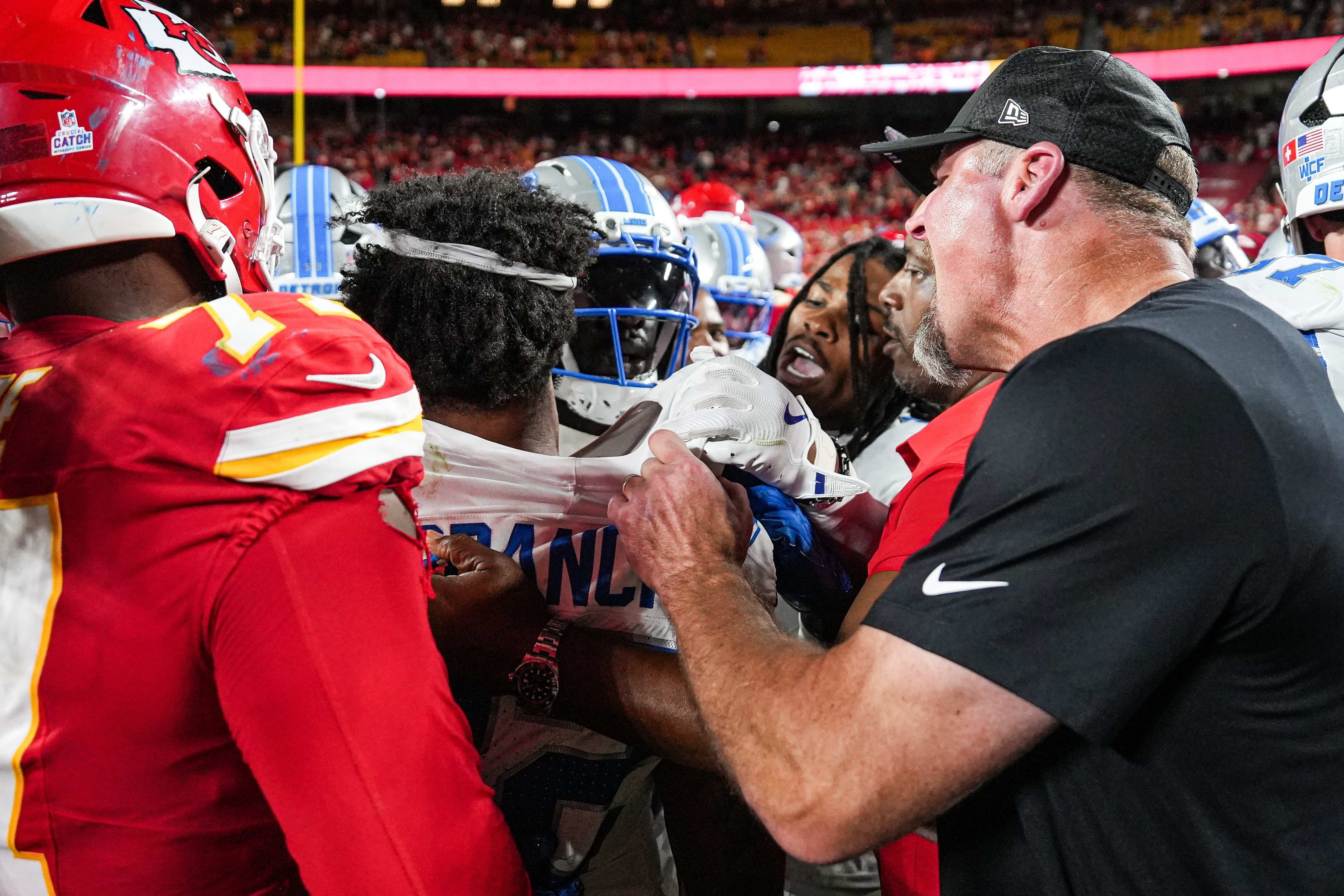 Detroit Lions head coach Dan Campbell tries pull safety Brian Branch out from the scuffle after 30-17 loss to Kansas City Chiefs at Arrowhead Stadium in Kansas City, Missouri on Sunday, Oct. 12, 2025.
