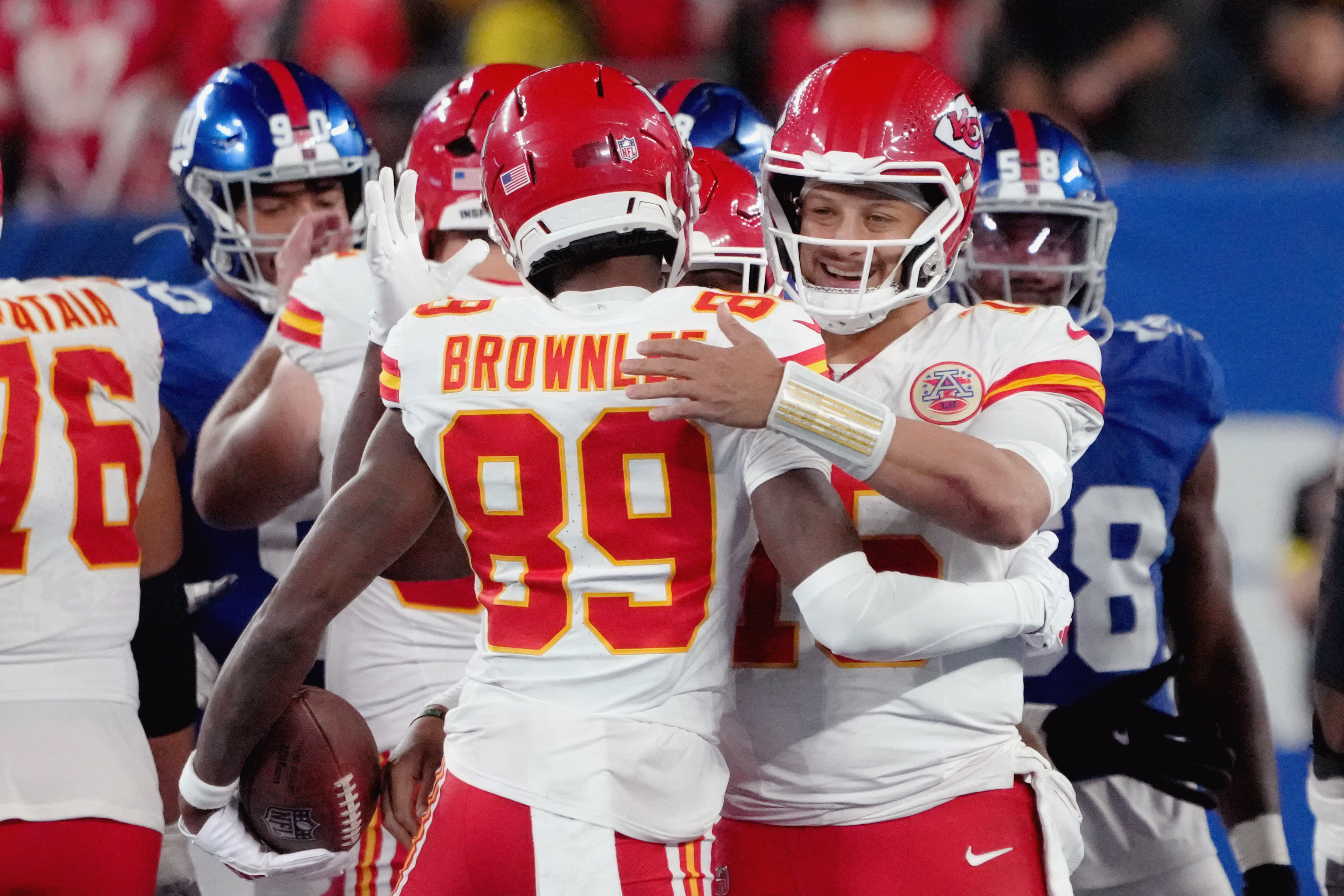 Sep 21, 2025; East Rutherford, New Jersey, USA;
Kansas City Chiefs quarterback Patrick Mahomes (15) adn wide receiver Jason Brownlee (89) celebrate after defeating the New York Giants at MetLife Stadium.