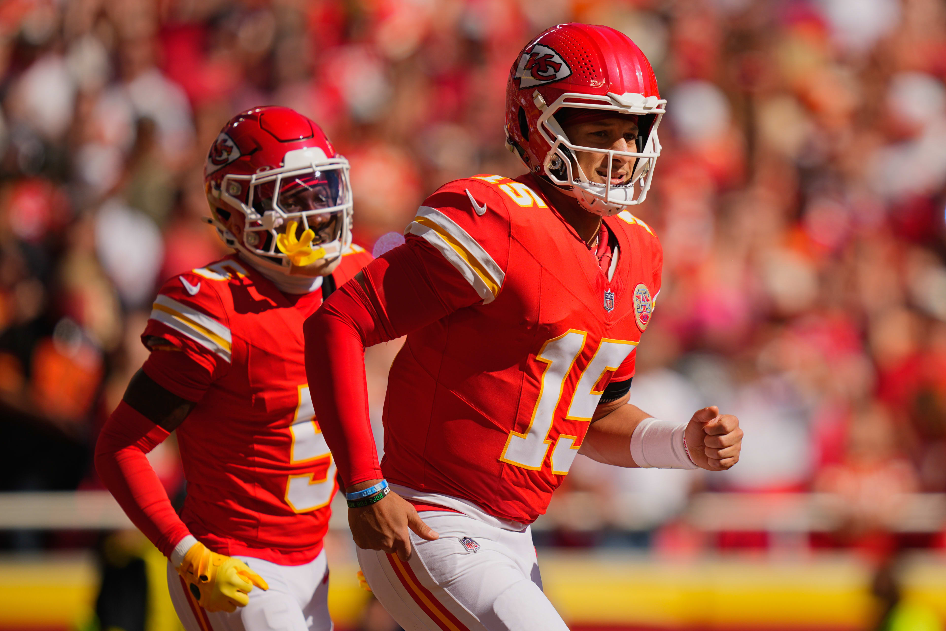 Kansas City Chiefs quarterback Patrick Mahomes (15) and wide receiver Marquise Brown (5)