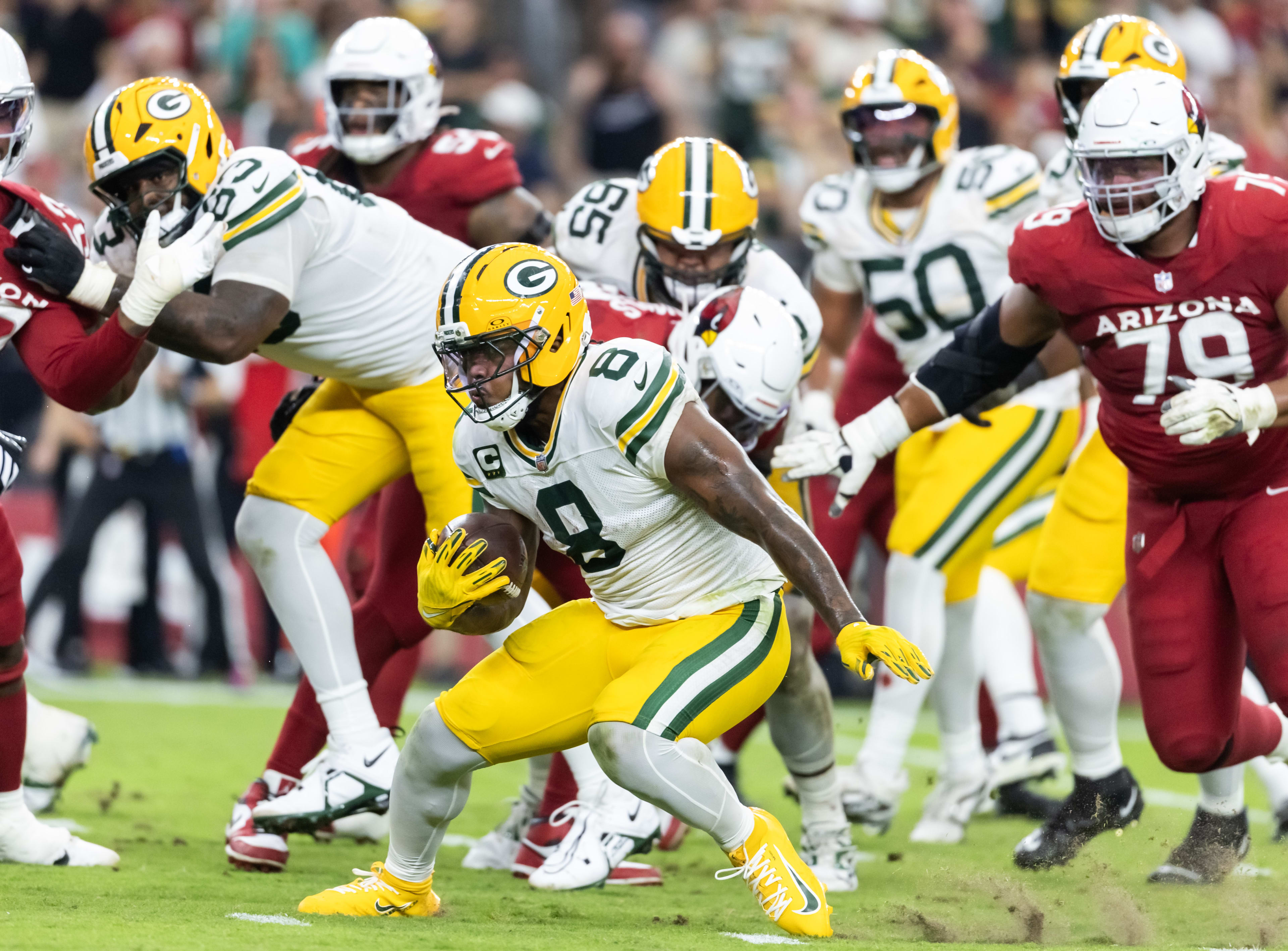 Oct 19, 2025; Glendale, Arizona, USA; Green Bay Packers running back Josh Jacobs (8) against the Arizona Cardinals in the second half at State Farm Stadium.