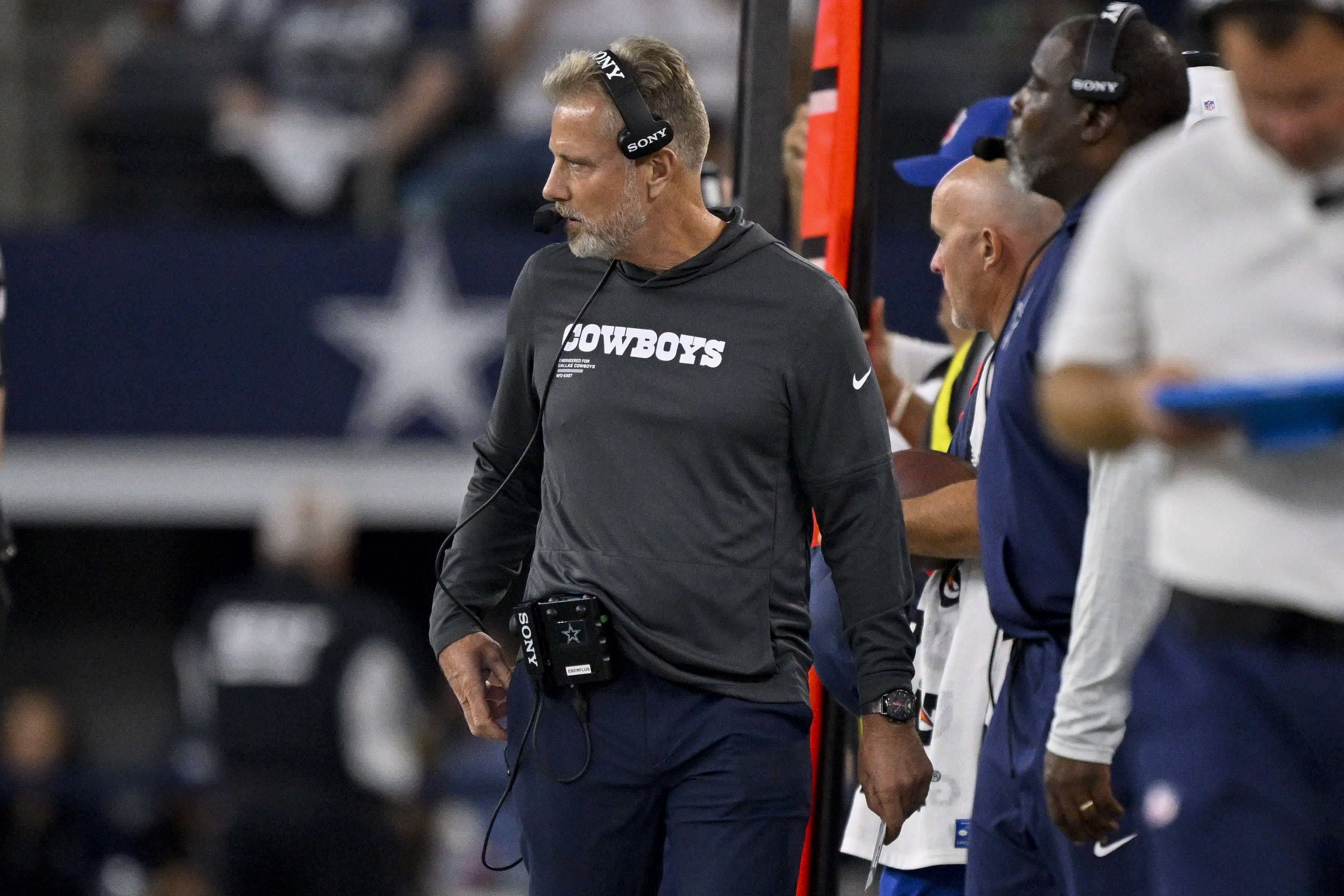 Aug 16, 2025; Arlington, Texas, USA; Dallas Cowboys defensive coordinator Matt Eberflus looks on during the game between the Dallas Cowboys and the Baltimore Ravens at AT&T Stadium. 
