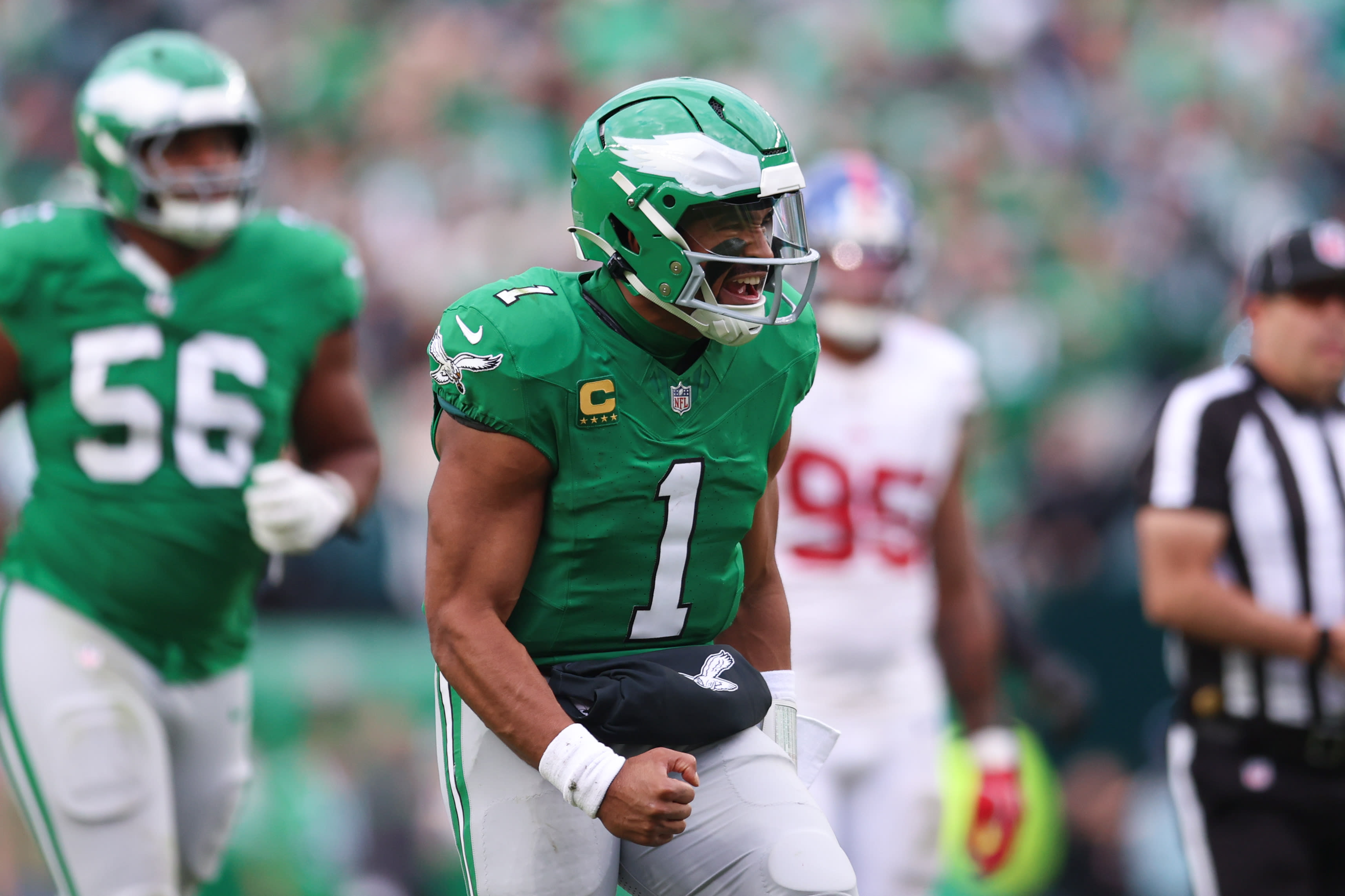 Philadelphia Eagles quarterback Jalen Hurts (1) reacts after his touchdown pass against the New York Giants during the fourth quarter at Lincoln Financial Field.
