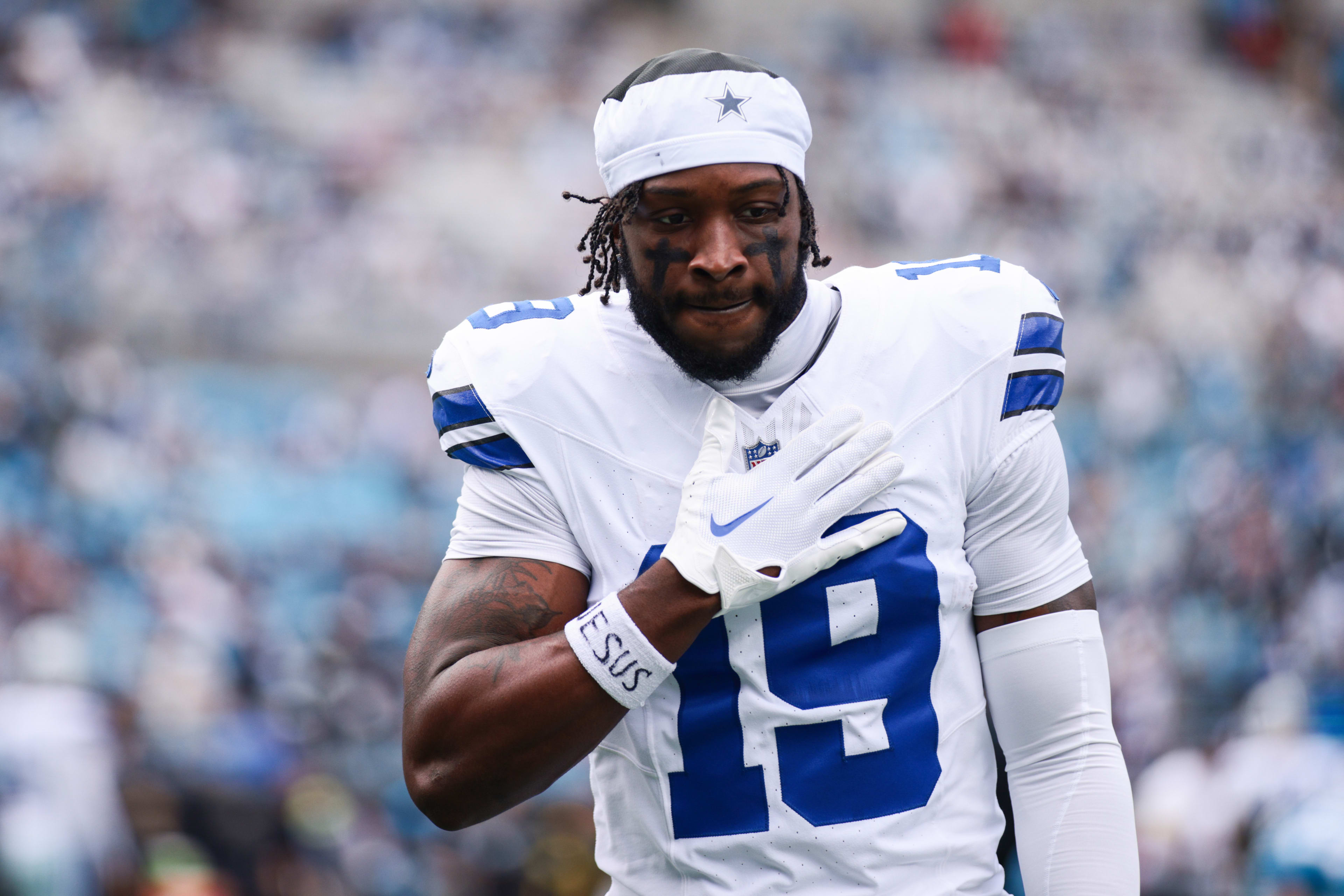 Oct 12, 2025; Charlotte, North Carolina, USA; Dallas Cowboys wide receiver Ryan Flournoy (19) looks on before the start of the game against the Carolina Panthers at Bank of America Stadium.