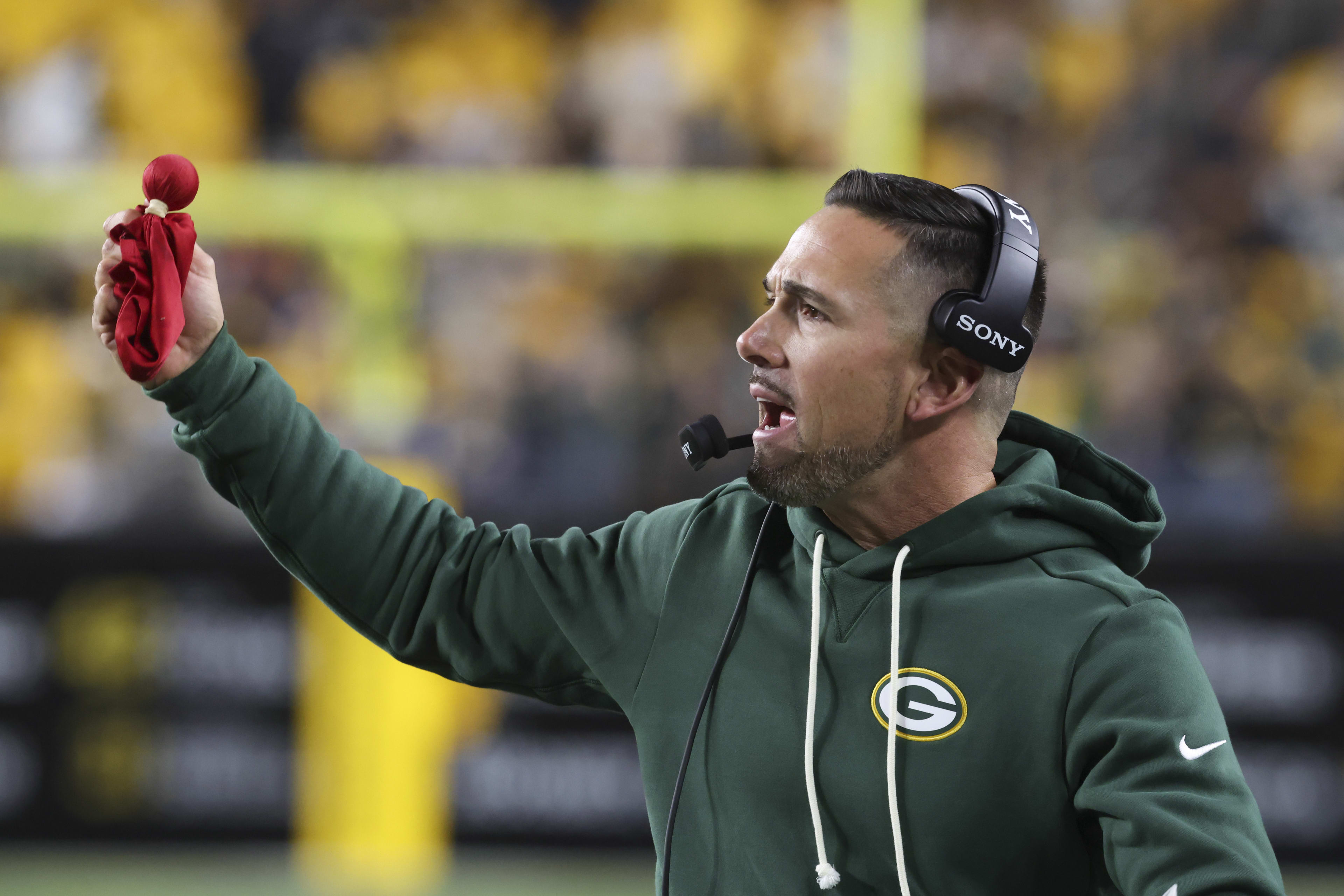 Oct 26, 2025; Pittsburgh, Pennsylvania, USA; Green Bay Packers head coach Matt LaFleur challenges the call during the fourth quarter against the Pittsburgh Steelers at Acrisure Stadium.
