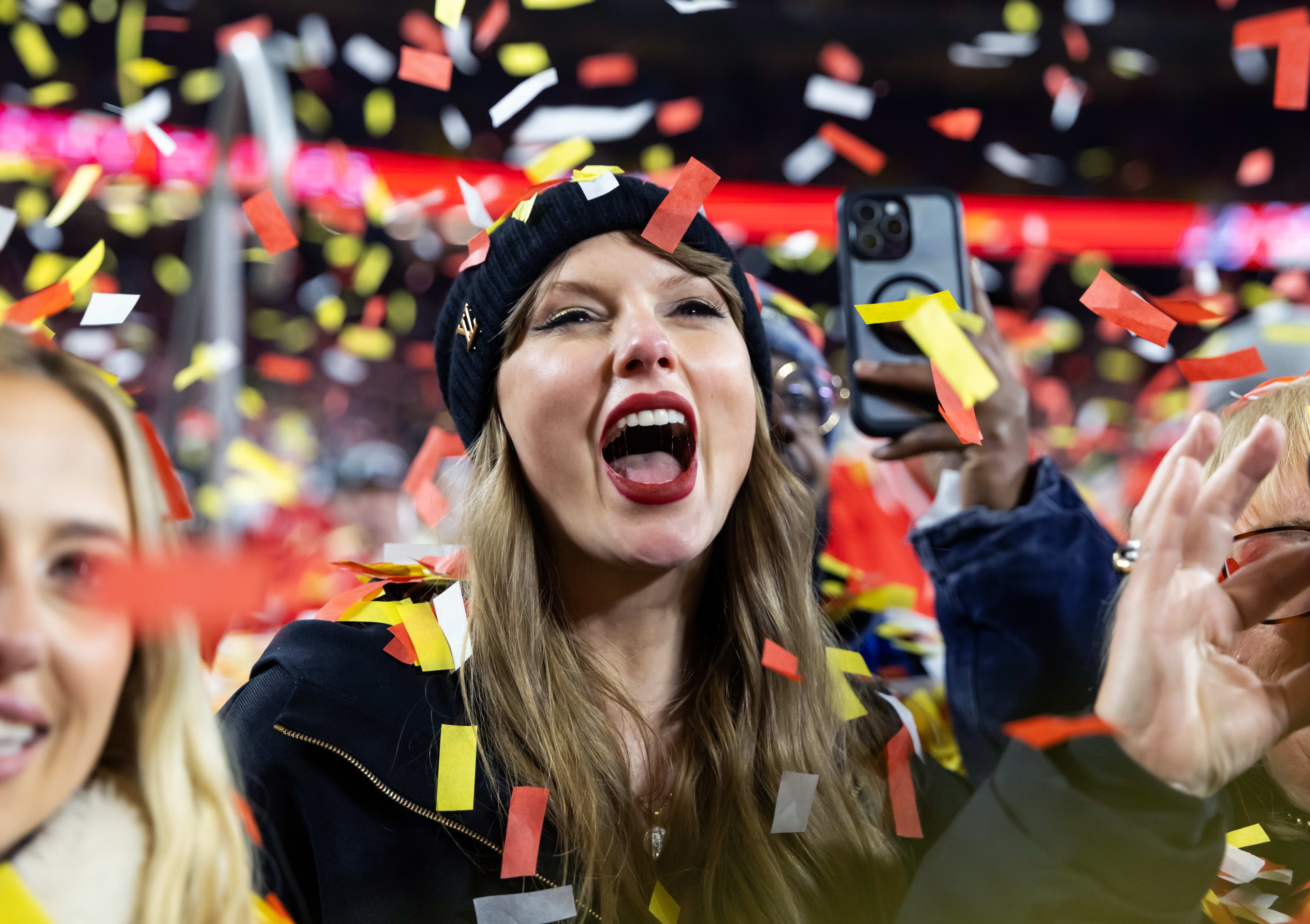 Jan 26, 2025; Kansas City, MO, USA; Recording artist Taylor Swift celebrates after the AFC Championship game against the Buffalo Bills at GEHA Field at Arrowhead Stadium. Mandatory Credit: Mark J. Rebilas-Imagn Images