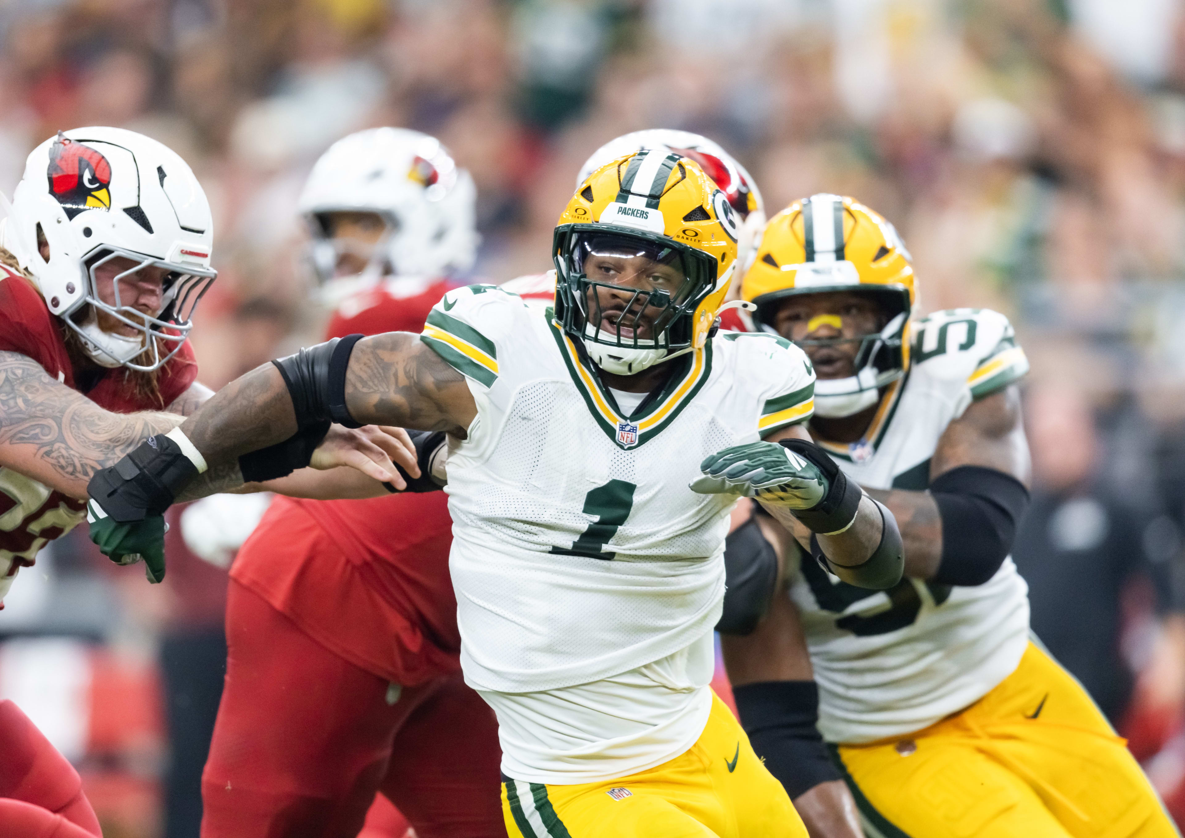 Oct 19, 2025; Glendale, Arizona, USA; Green Bay Packers defensive lineman Micah Parsons (1) against the Arizona Cardinals at State Farm Stadium.
