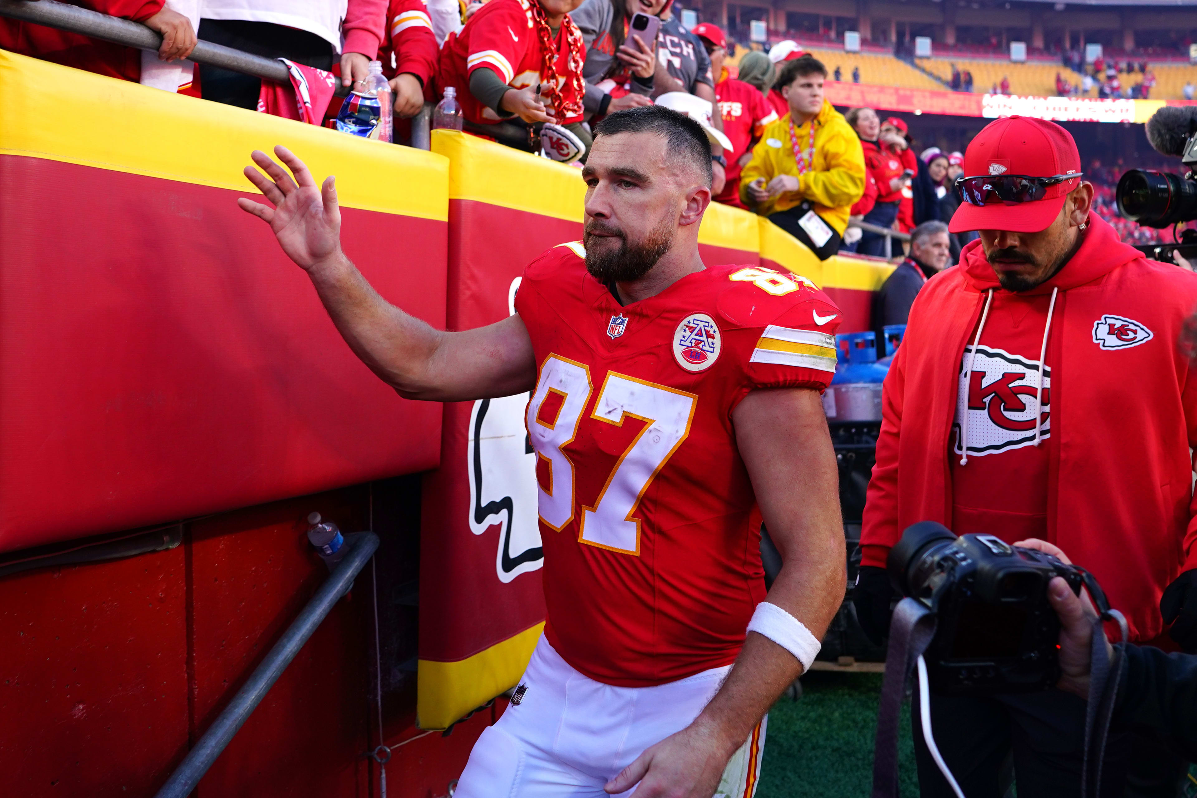 Nov 23, 2025; Kansas City, Missouri, USA; Kansas City Chiefs tight end Travis Kelce (87) greets fans after the game against the Indianapolis Colts at GEHA Field at Arrowhead Stadium. Mandatory Credit: Denny Medley-Imagn Images
