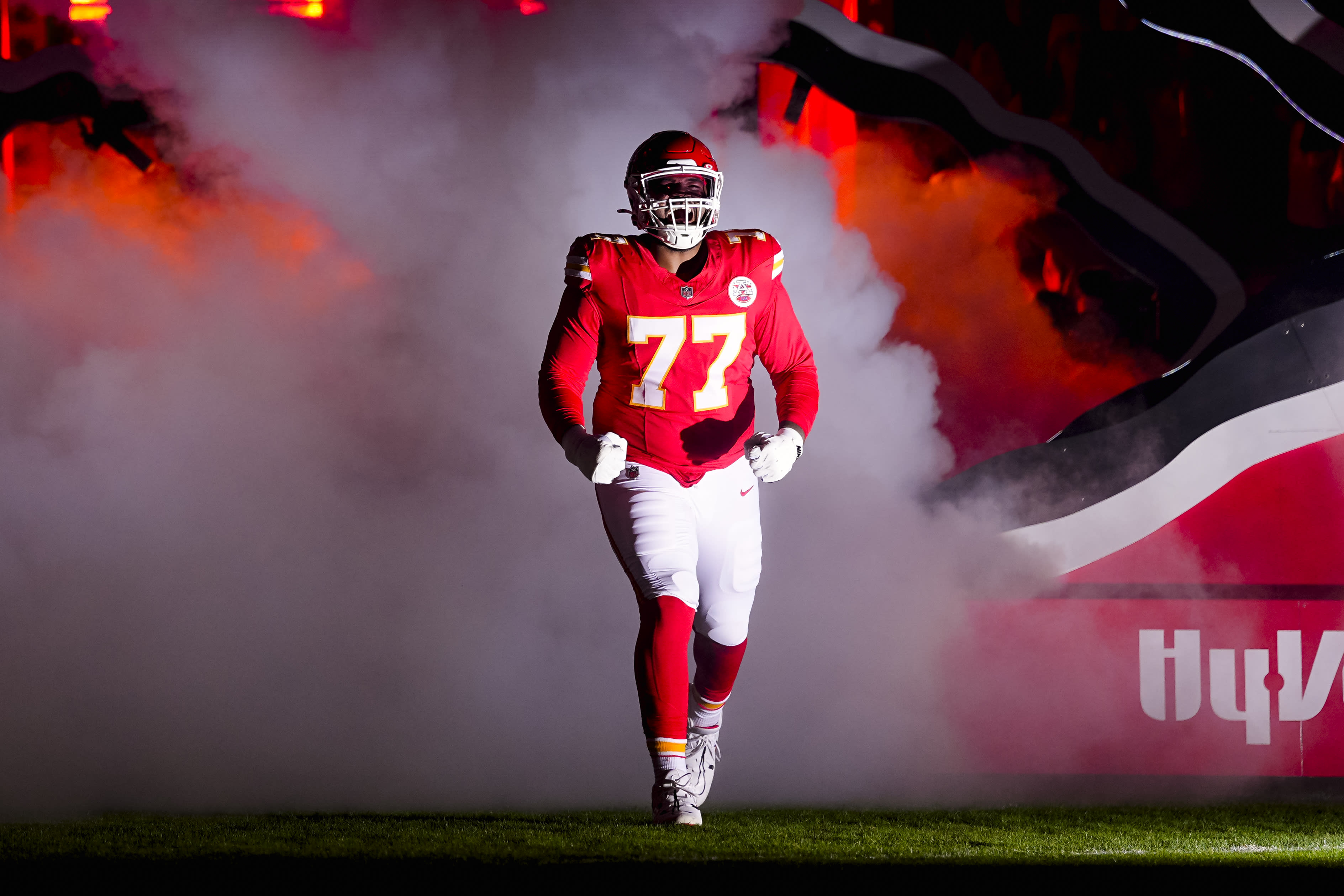 Oct 27, 2025; Kansas City, Missouri, USA; Kansas City Chiefs guard Jaylon Moore (77) takes the field prior to a game against the Washington Commanders at GEHA Field at Arrowhead Stadium. Mandatory Credit: Jay Biggerstaff-Imagn Images