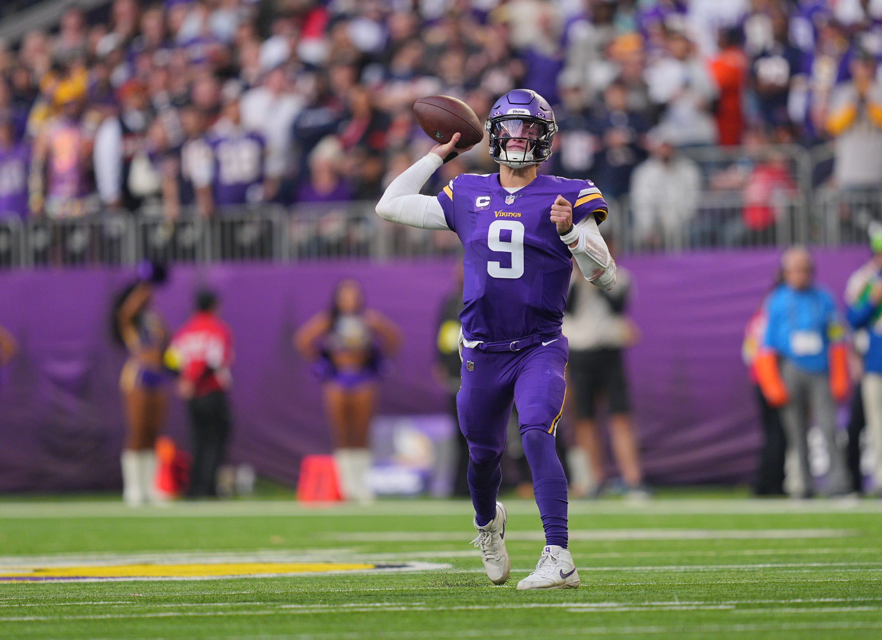 Nov 16, 2025; Minneapolis, Minnesota, USA; Minnesota Vikings quarterback J.J. McCarthy (9) throws downfield during the fourth quarter against the Chicago Bears at U.S. Bank Stadium.