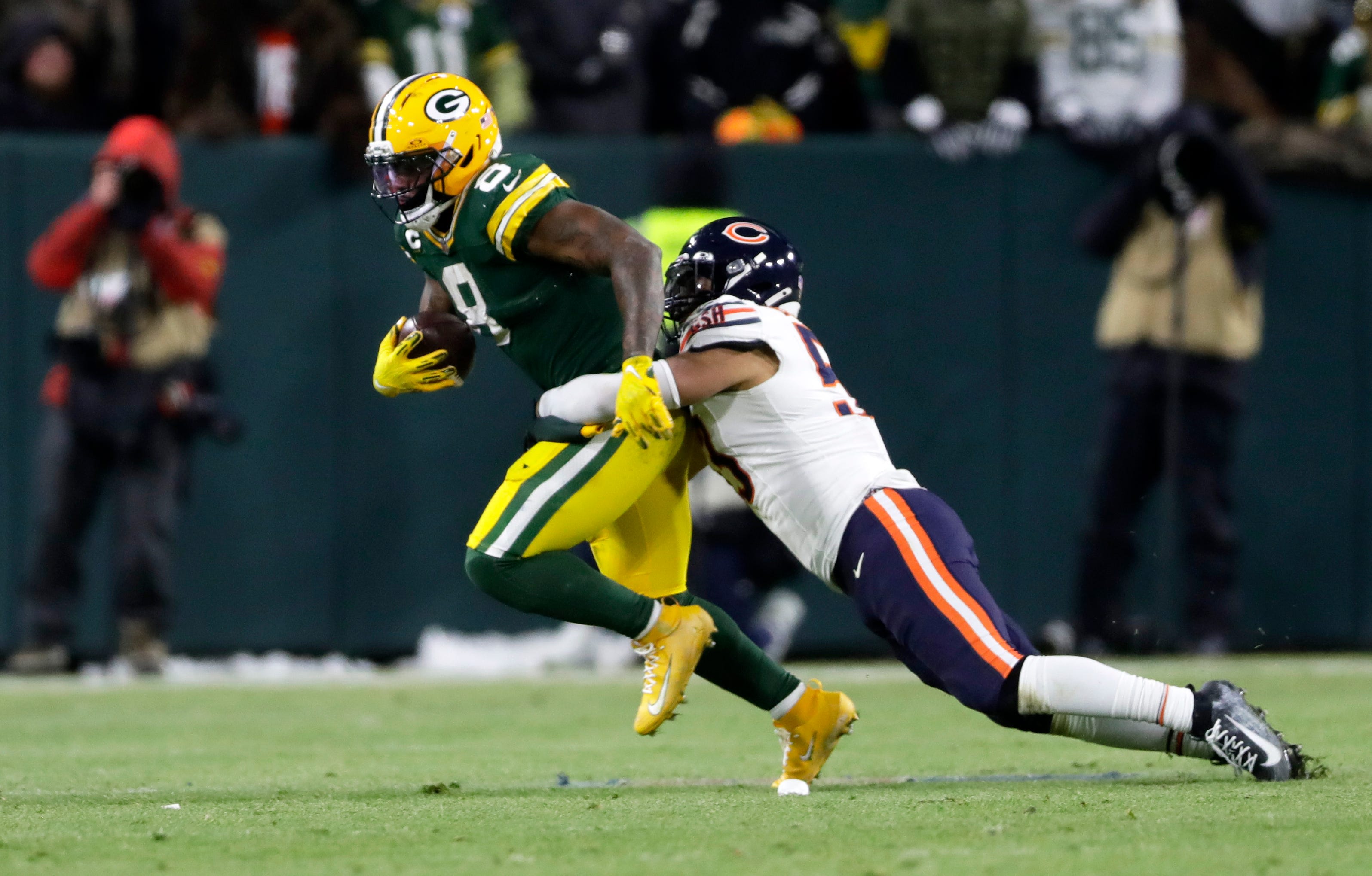 Green Bay Packers running back Josh Jacobs (8) runs the ball during a football game against the Chicago Bears on Dec. 7, 2025, at Lambeau Field in Green Bay, Wis. The Packers defeated the Bears 28-21.