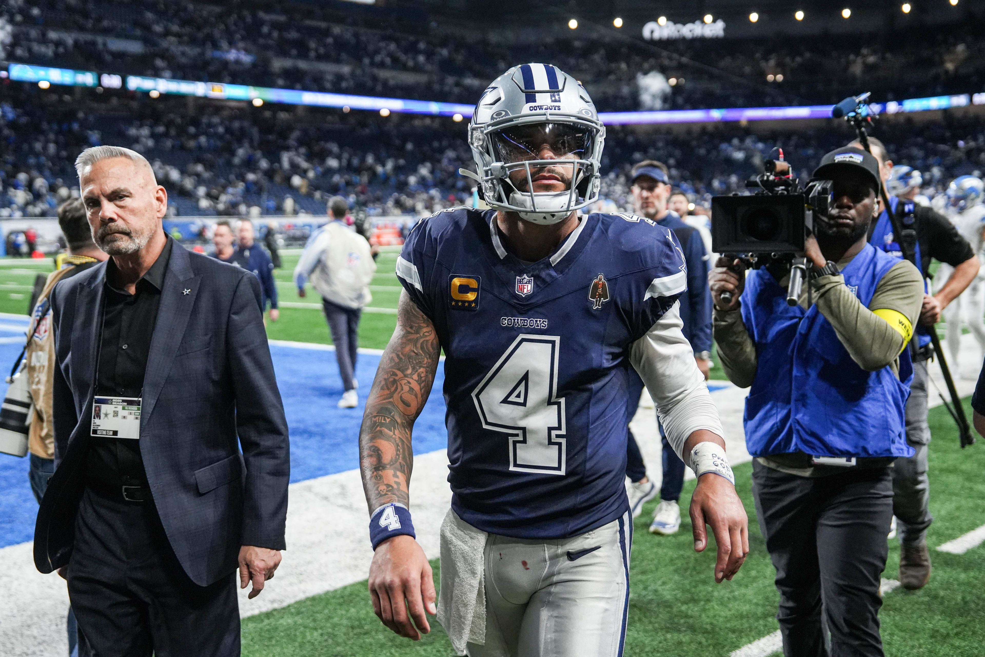 Dallas Cowboys quarterback Dak Prescott (4) walks off the field after 44-30 loss at Ford Field in Detroit on Thursday, Dec. 4, 2025.