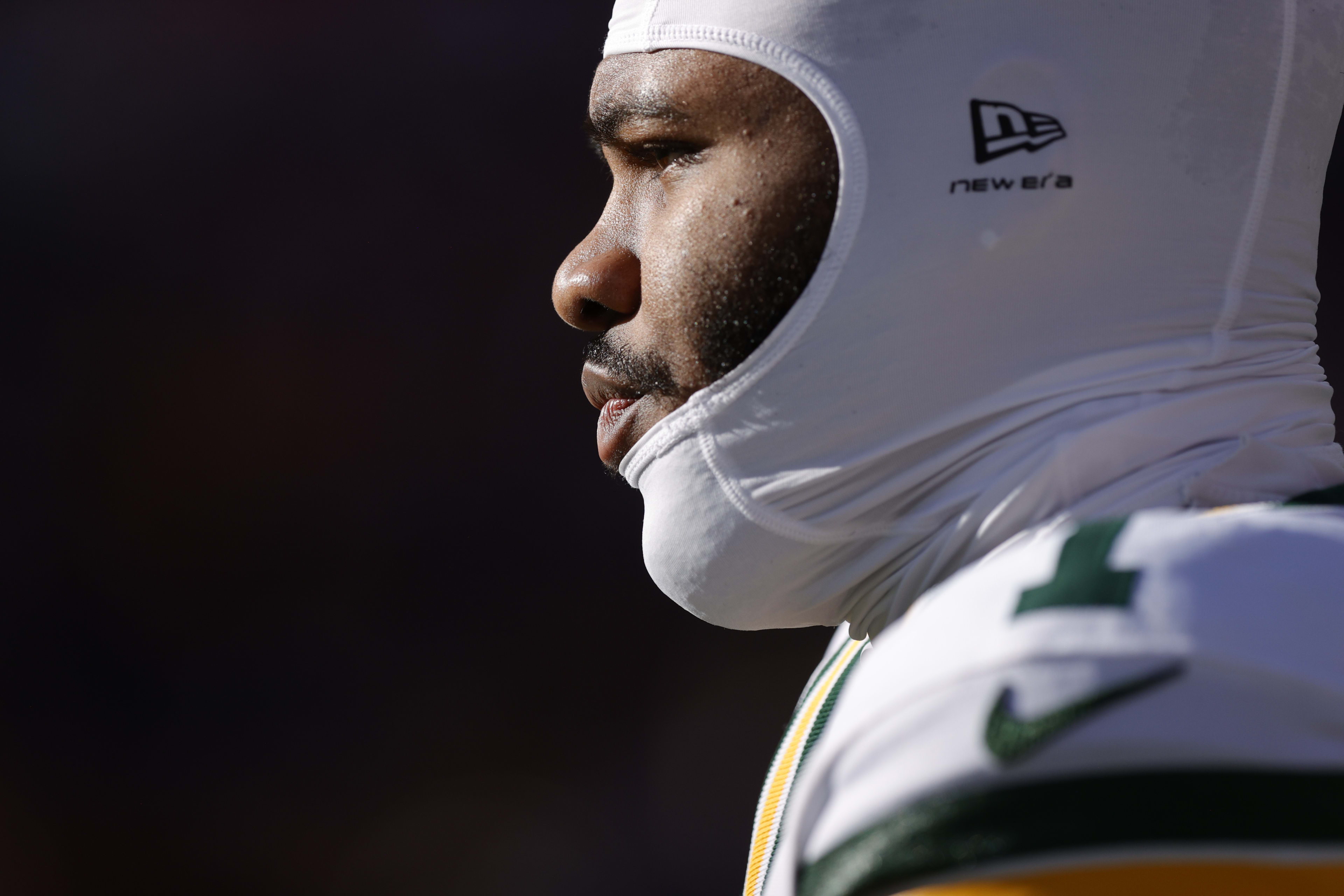 Dec 14, 2025; Denver, Colorado, USA; Green Bay Packers defensive end Micah Parsons (1) warms up before a game against the Denver Broncos at Empower Field at Mile High.