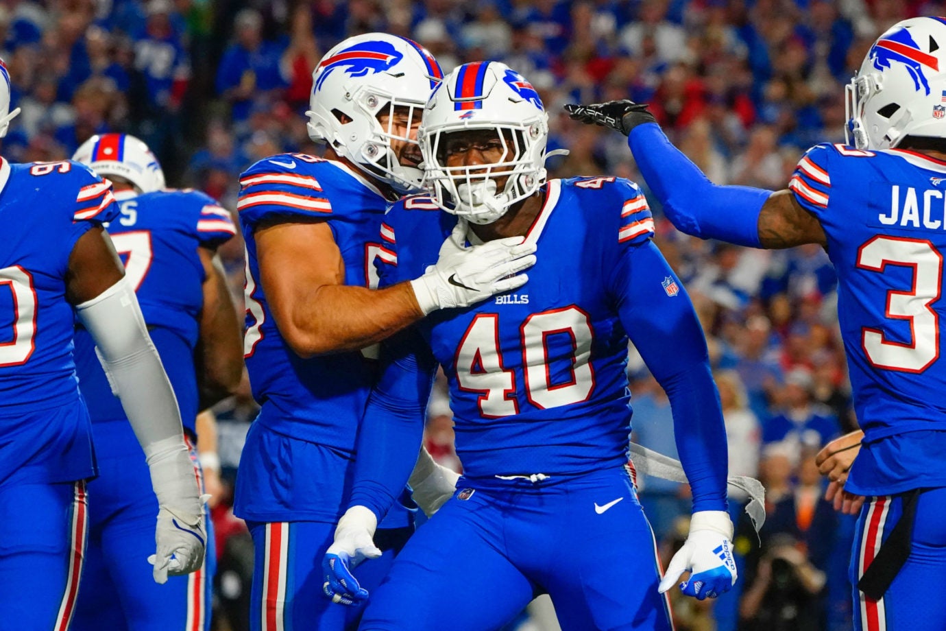 Sep 19, 2022; Orchard Park, New York, USA; Buffalo Bills linebacker Von Miller (40) and Buffalo Bills linebacker Matt Milano (58) react to making a play during the first half against the Tennessee Titans at Highmark Stadium. Mandatory Credit: Gregory Fisher-USA TODAY Sports