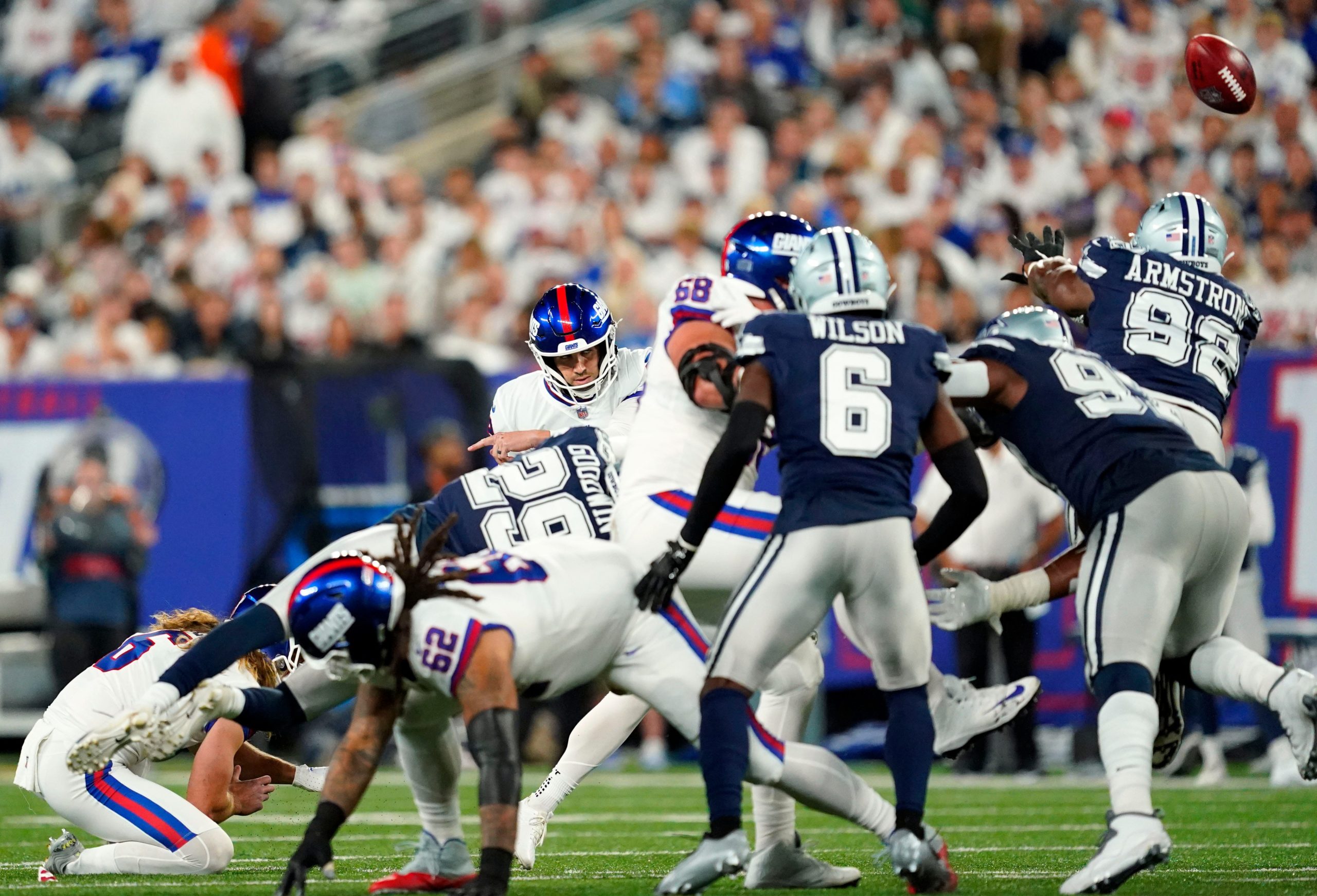 Dallas Cowboys defensive end Dorance Armstrong (92) blocks a field goal attempt by New York Giants place kicker Graham Gano (9) in the first half at MetLife Stadium on Monday, Sept. 26, 2022. Nfl Ny Giants Vs Dallas Cowboys Cowboys At Giants