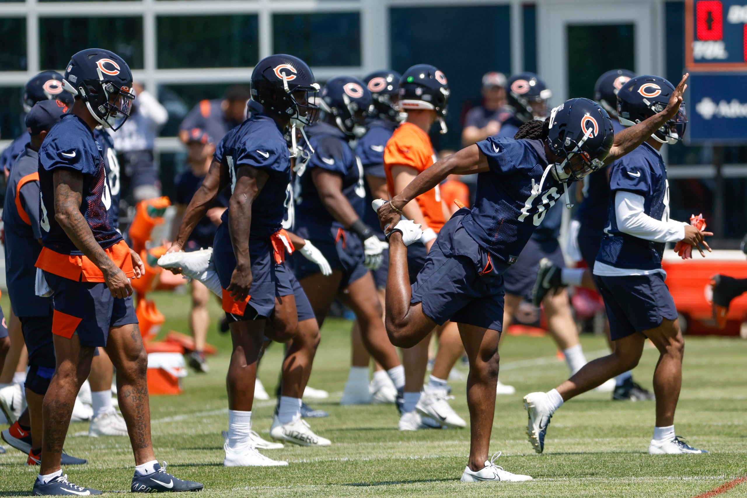 Jun 14, 2022; Lake Forest, Illinois, USA; Chicago Bears players warm up during minicamp at Halas Hall. Mandatory Credit: Kamil Krzaczynski-USA TODAY Sports