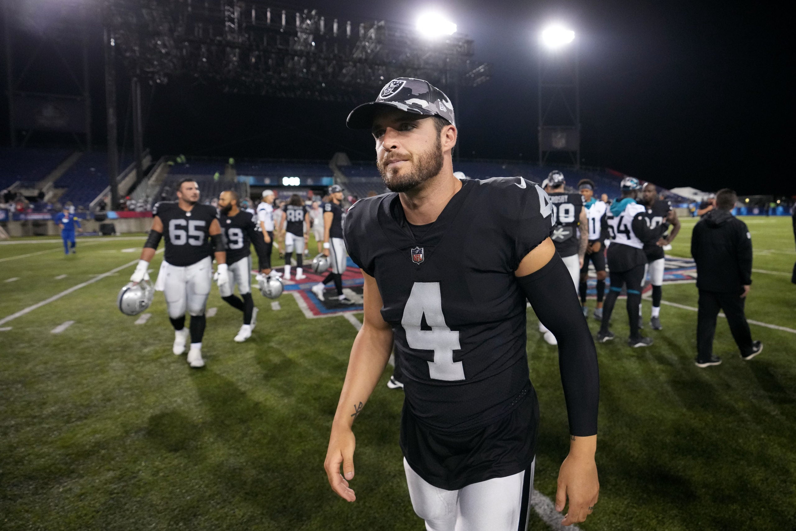 saints Las Vegas Raiders quarterback Derek Carr (4) leaves the field after the Raiders defeated the Jaguars in the 2022 Hall of Fame game at Tom Benson Hall of Fame Stadium.