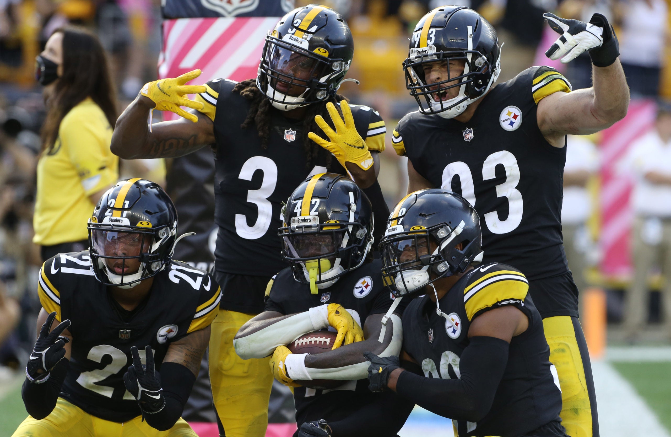Oct 10, 2021; Pittsburgh, Pennsylvania, USA;  Pittsburgh Steelers safety Terrell Edmunds (34) and inside linebacker Joe Schobert (93) and cornerback Tre Norwood (21) and free safety Minkah Fitzpatrick (39) celebrate a game clinching interception by Steelers cornerback James Pierre (42) against the Denver Broncos during the fourth quarter at Heinz Field. Mandatory Credit: Charles LeClaire-USA TODAY Sports