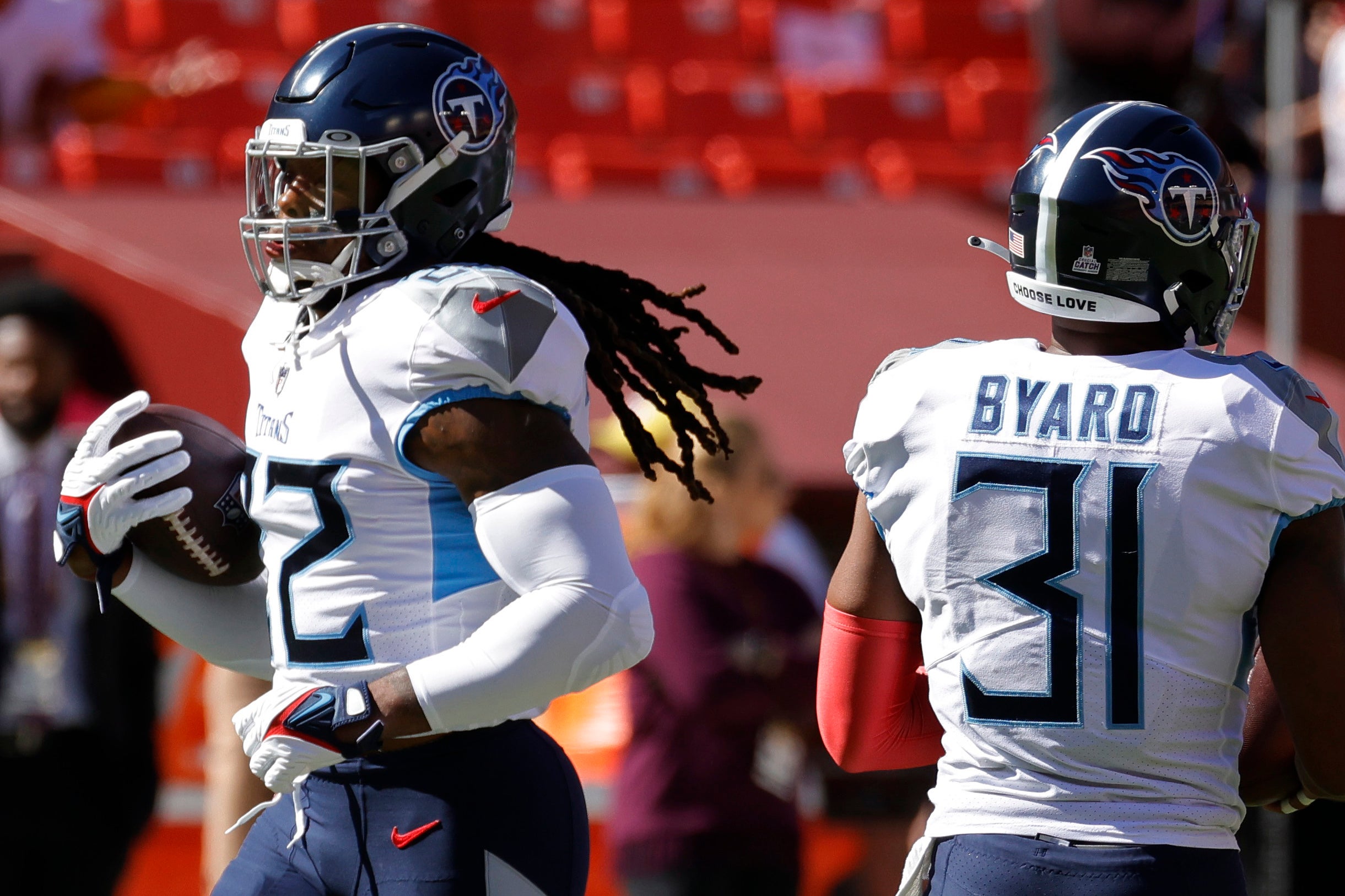 Oct 9, 2022; Landover, Maryland, USA; Tennessee Titans running back Derrick Henry (22) carries the ball during warmups prior to the Titans' game against the Washington Commanders at FedExField. Mandatory Credit: Geoff Burke-USA TODAY Sports