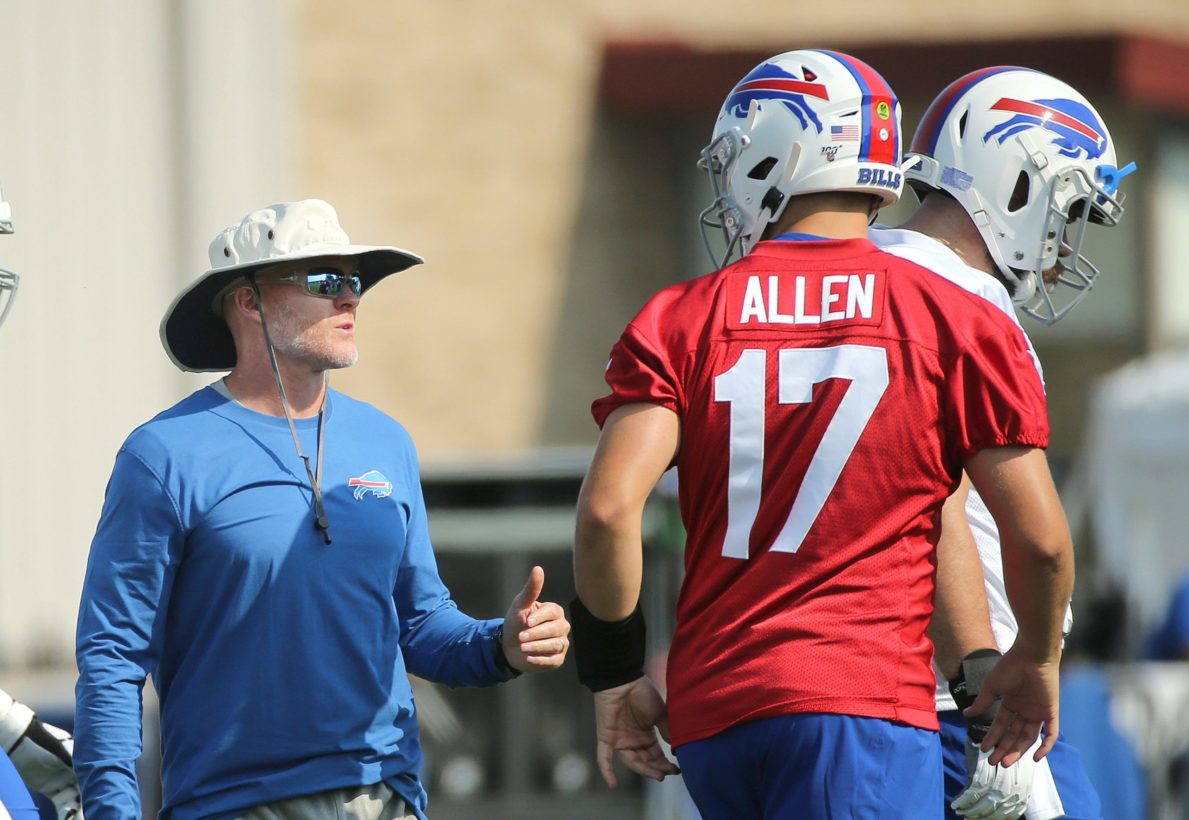 Bills head coach Sean McDermott  chats with quarterback Josh Allen between reps at training camp. JAMIE GERMANO/ROCHESTER DEMOCRAT AND CHRONICLE