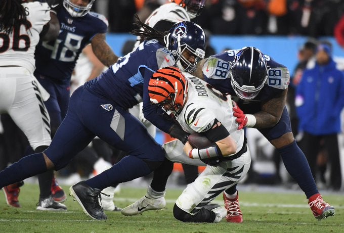 Tennessee Titans Cincinnati Bengals sacked sacks Joe Burrow Jeffery Simmons playoff posteason revenge game win lose loss NFL football offensive line oline dline defensive line sacks sacked nfl football news