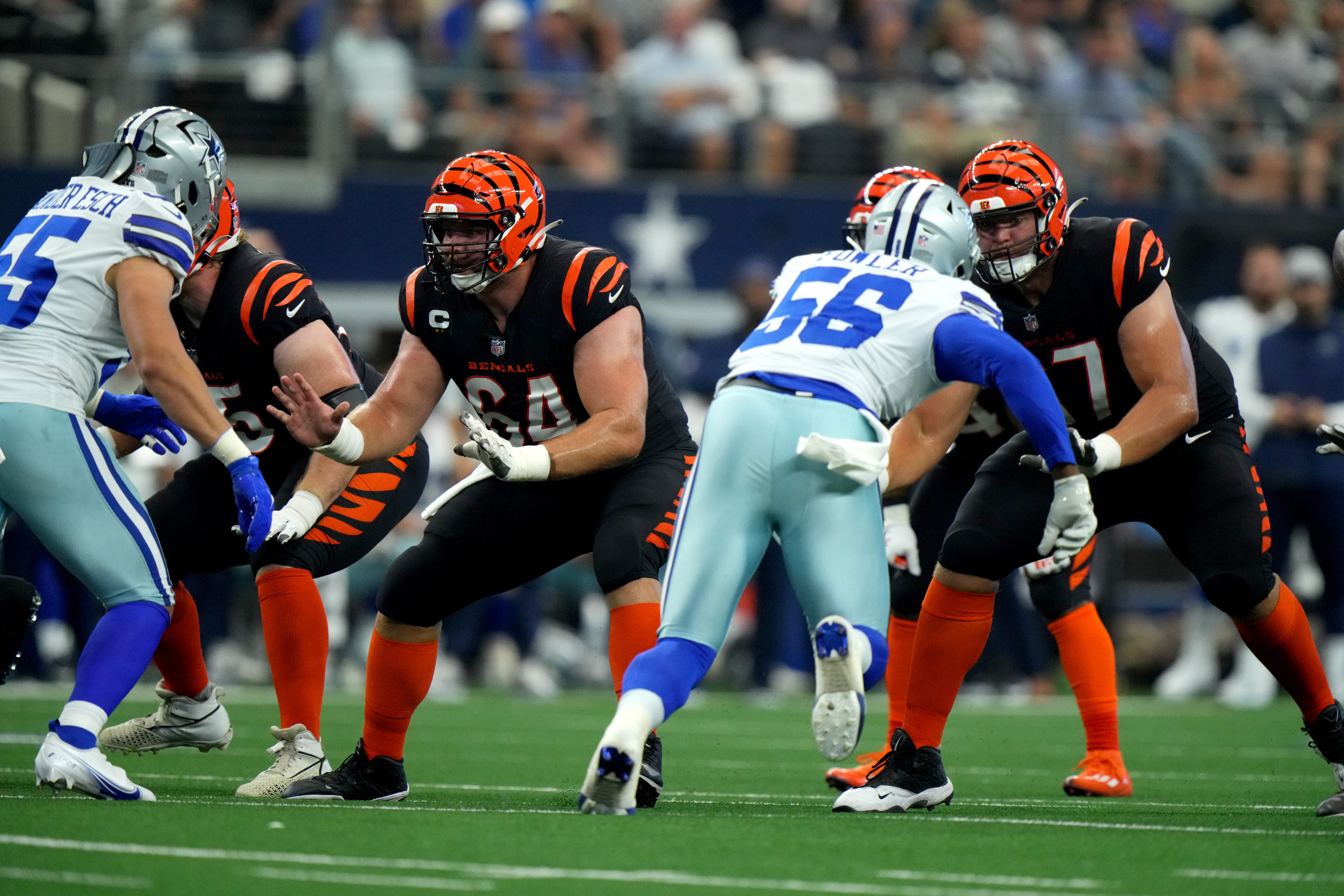 Cincinnati Bengals guard Alex Cappa (65), Cincinnati Bengals center Ted Karras (64) and Cincinnati Bengals offensive tackle Cordell Volson (67) block in the first quarter of an NFL Week 2 game against the Dallas Cowboys, Sunday, Sept. 18, 2022, at AT&T Stadium in Arlington, Texas. Nfl Cincinnati Bengals At Dallas Cowboys Sept 18 2174