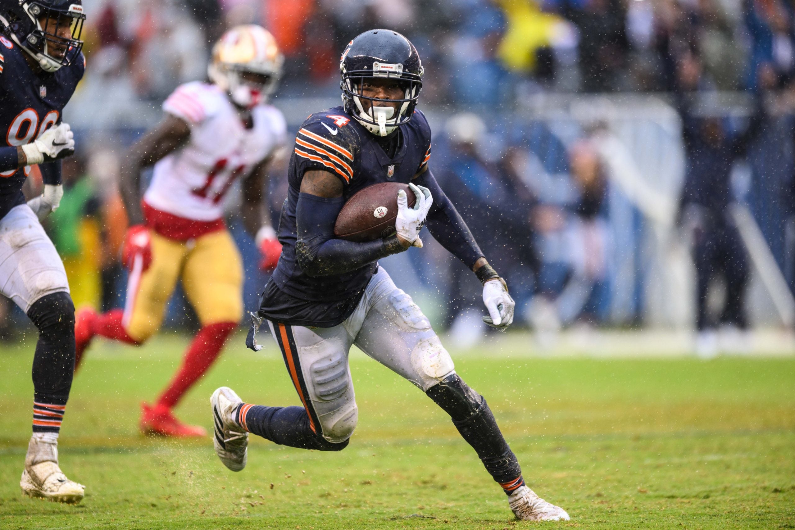 Sep 11, 2022; Chicago, Illinois, USA; Chicago Bears free safety Eddie Jackson (4) runs after his interception in the fourth quarter against the San Francisco 49ers at Soldier Field. Mandatory Credit: Daniel Bartel-USA TODAY Sports