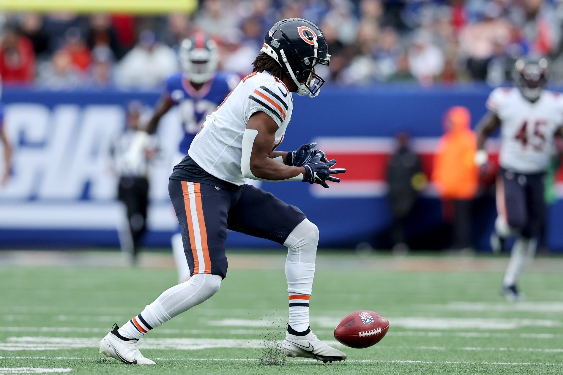Oct 2, 2022; East Rutherford, New Jersey, USA; Chicago Bears wide receiver Velus Jones Jr. (12) muffs a punt reception against the New York Giants during the fourth quarter at MetLife Stadium. The Giants recovered the loose ball. Mandatory Credit: Brad Penner-USA TODAY Sports